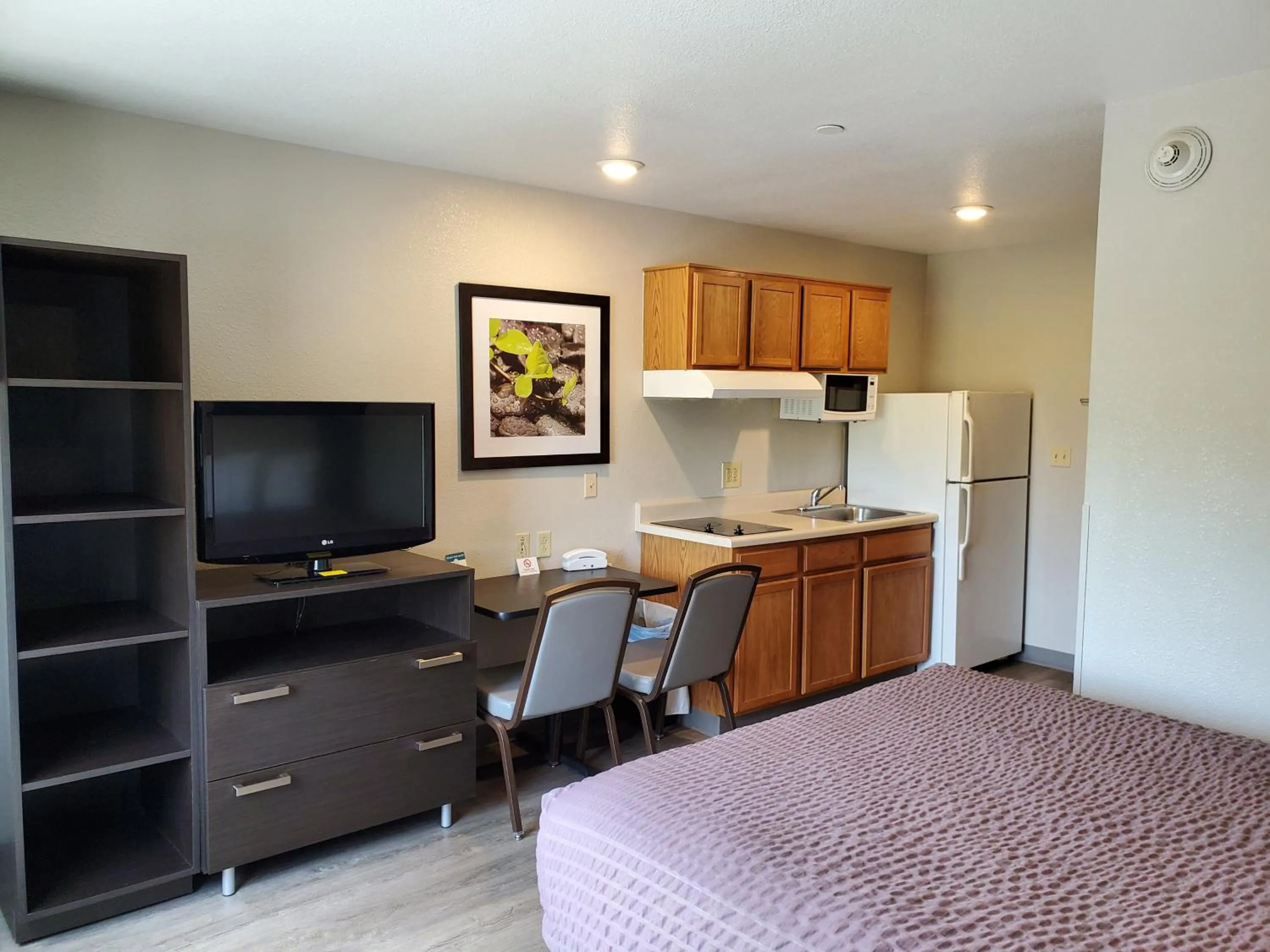 Photo of the whole room in WoodSpring Suites Raleigh Apex