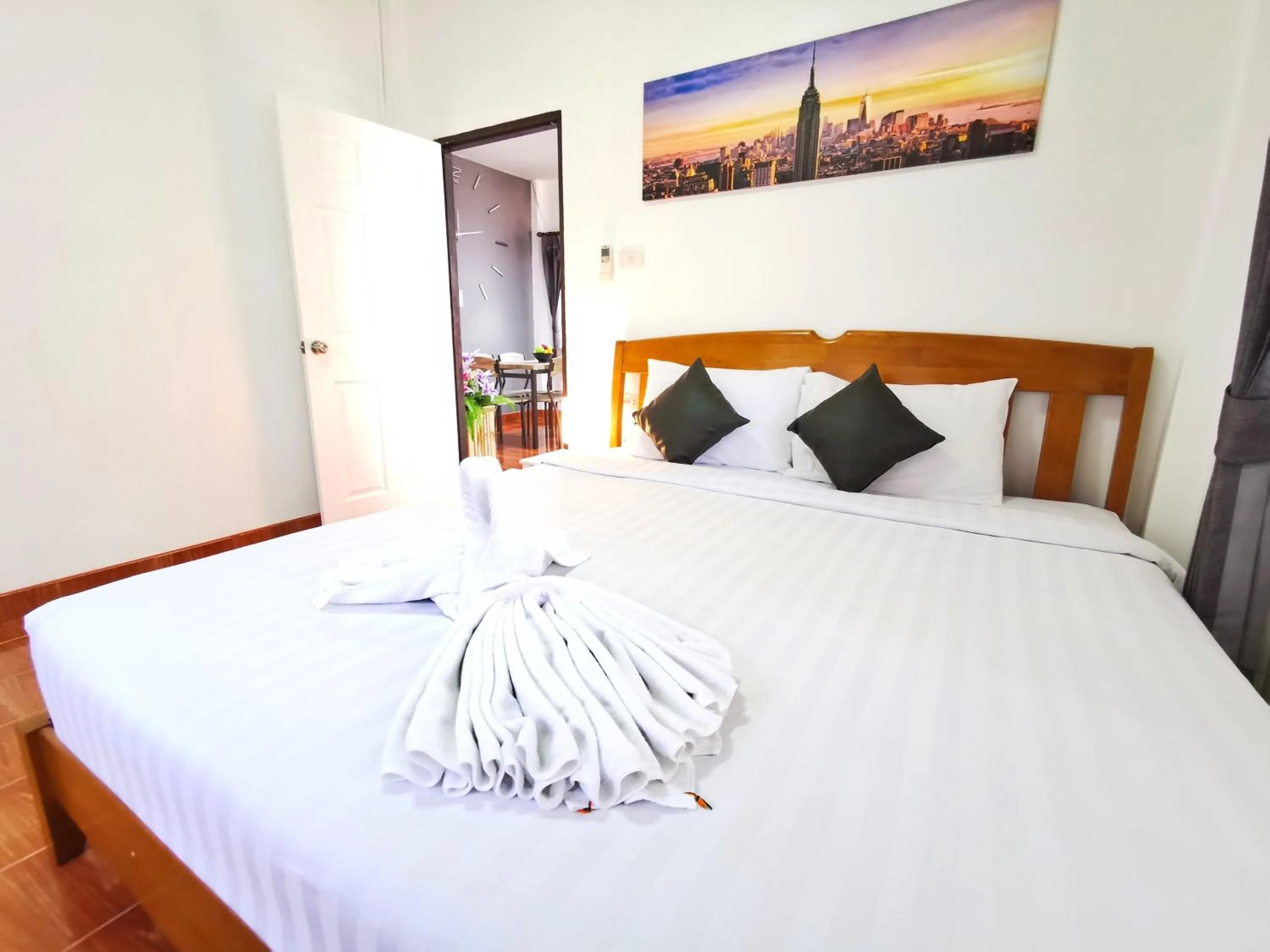 Bed in Thai Orange Villas