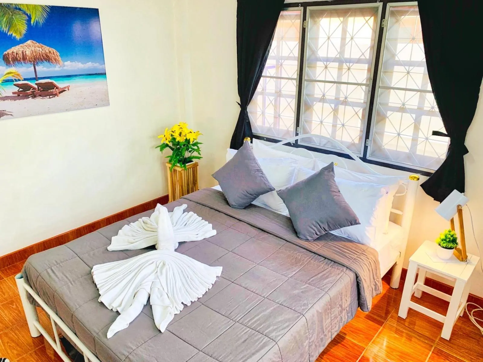 Bed in Thai Orange Villas