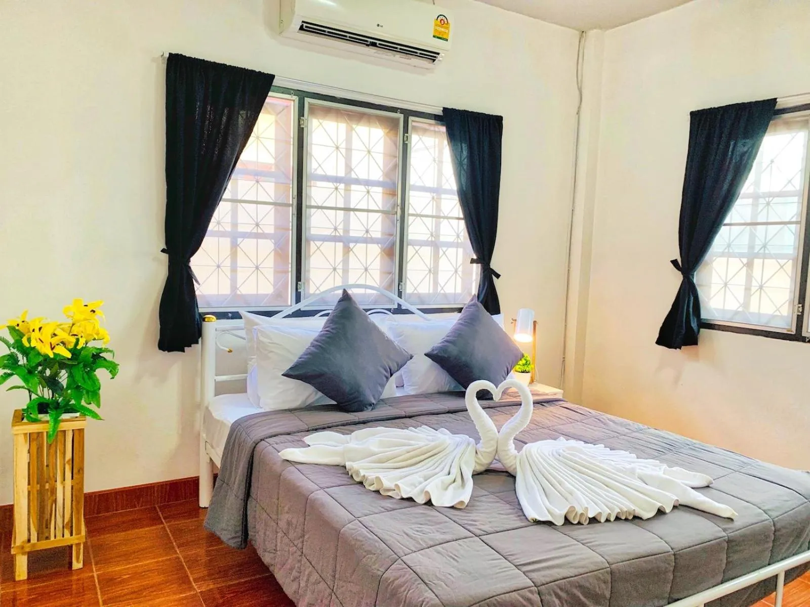 Bed in Thai Orange Villas