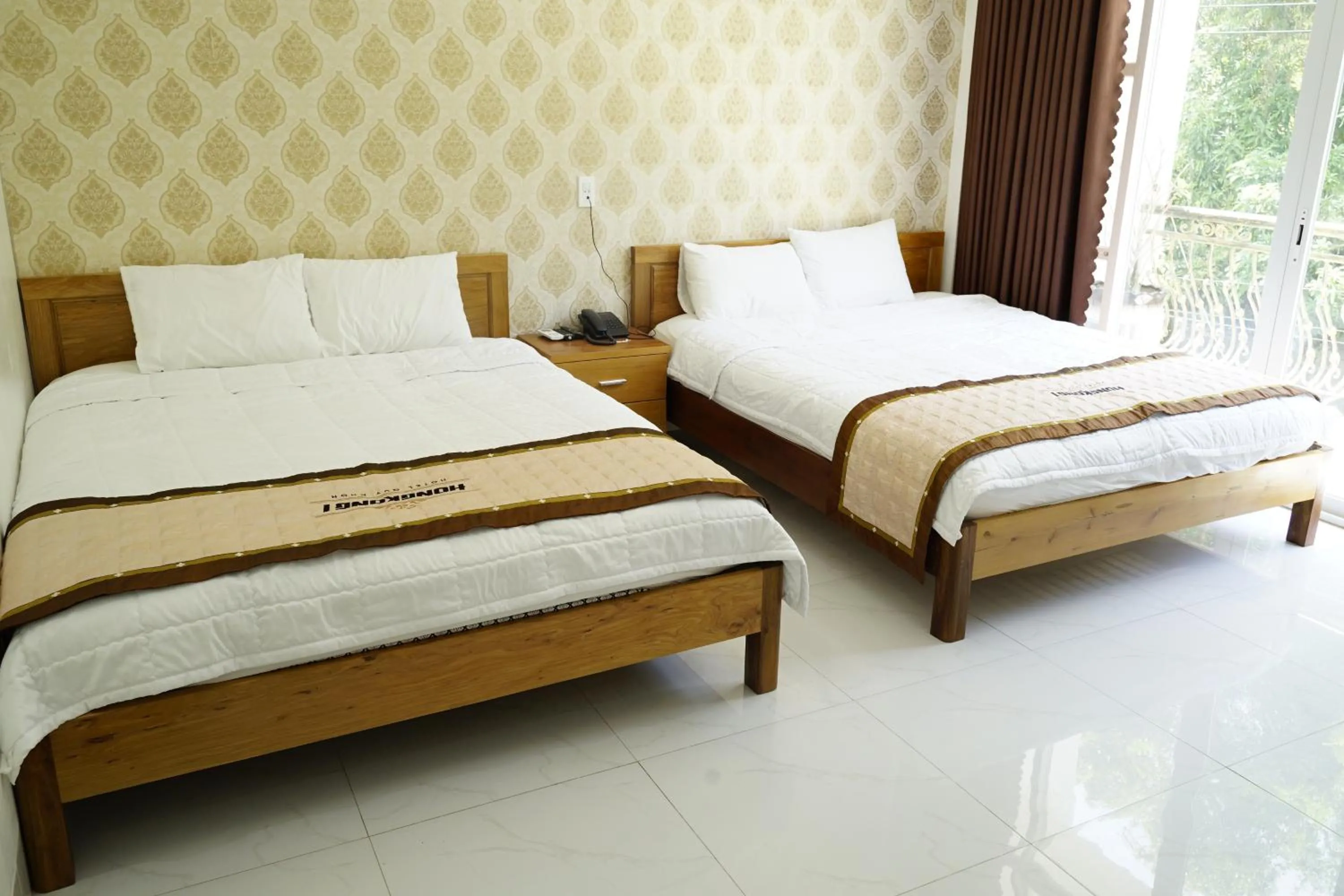 Bed in HongKong1 Hotel Quy Nhon