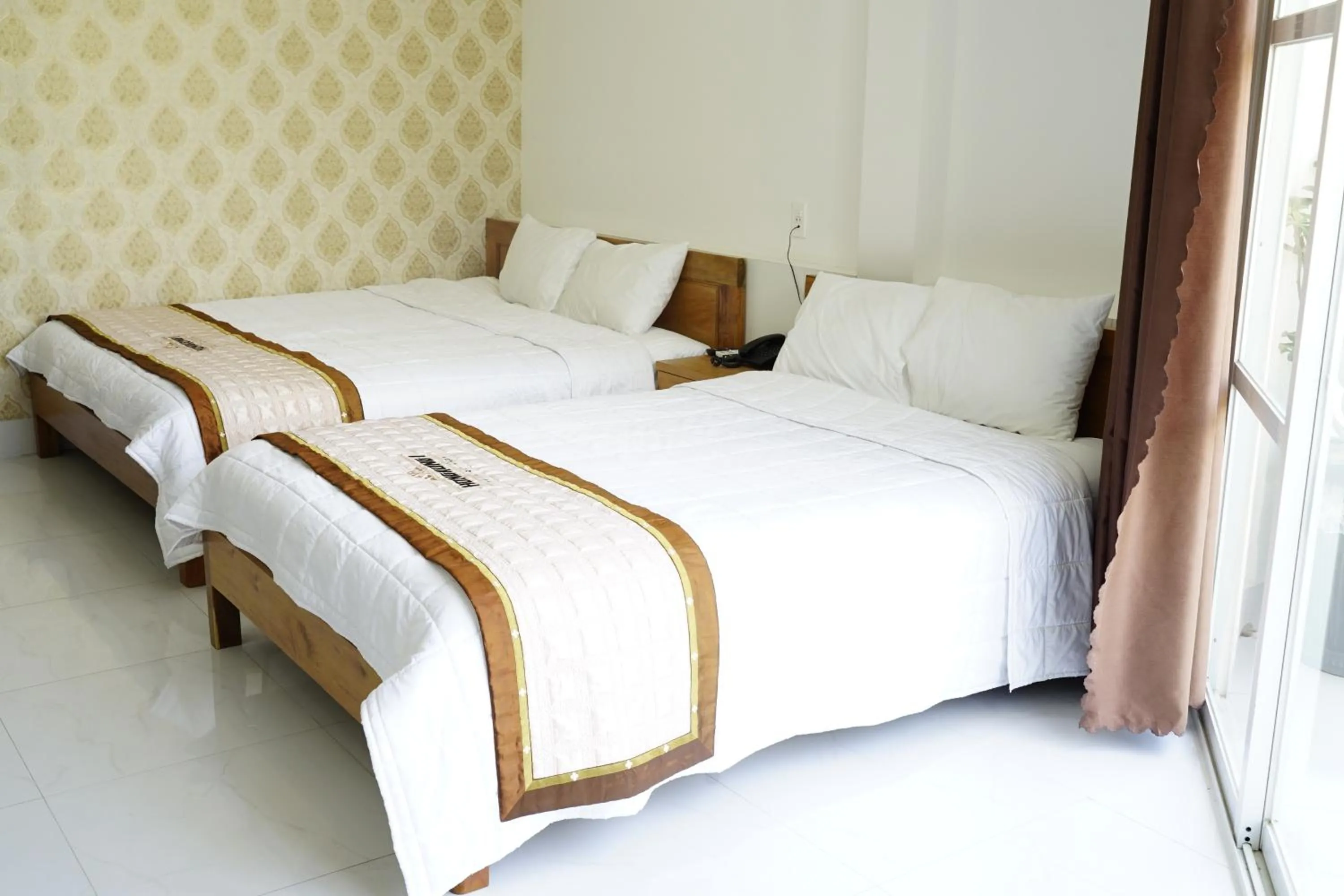 Bed in HongKong1 Hotel Quy Nhon