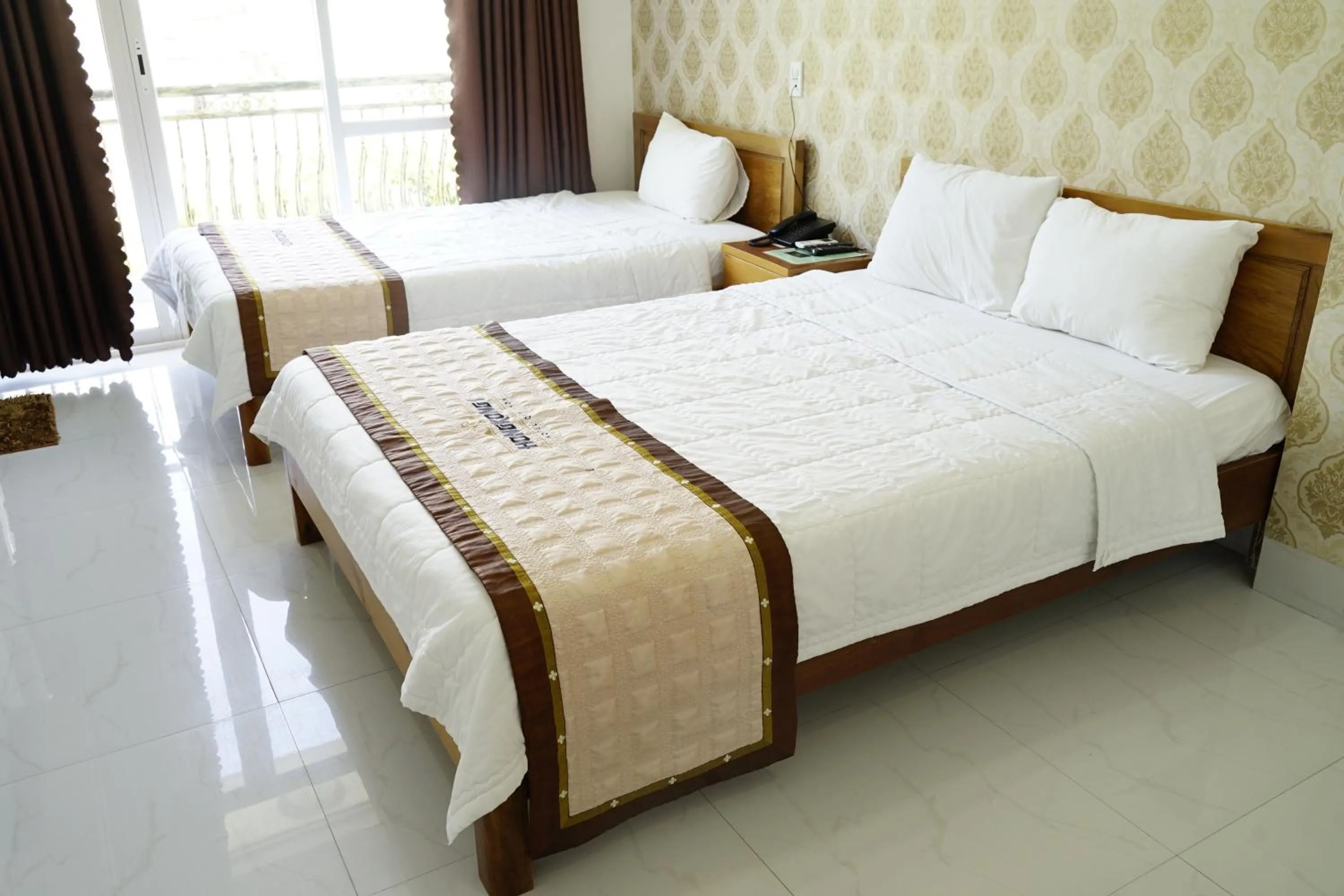 Bed in HongKong1 Hotel Quy Nhon