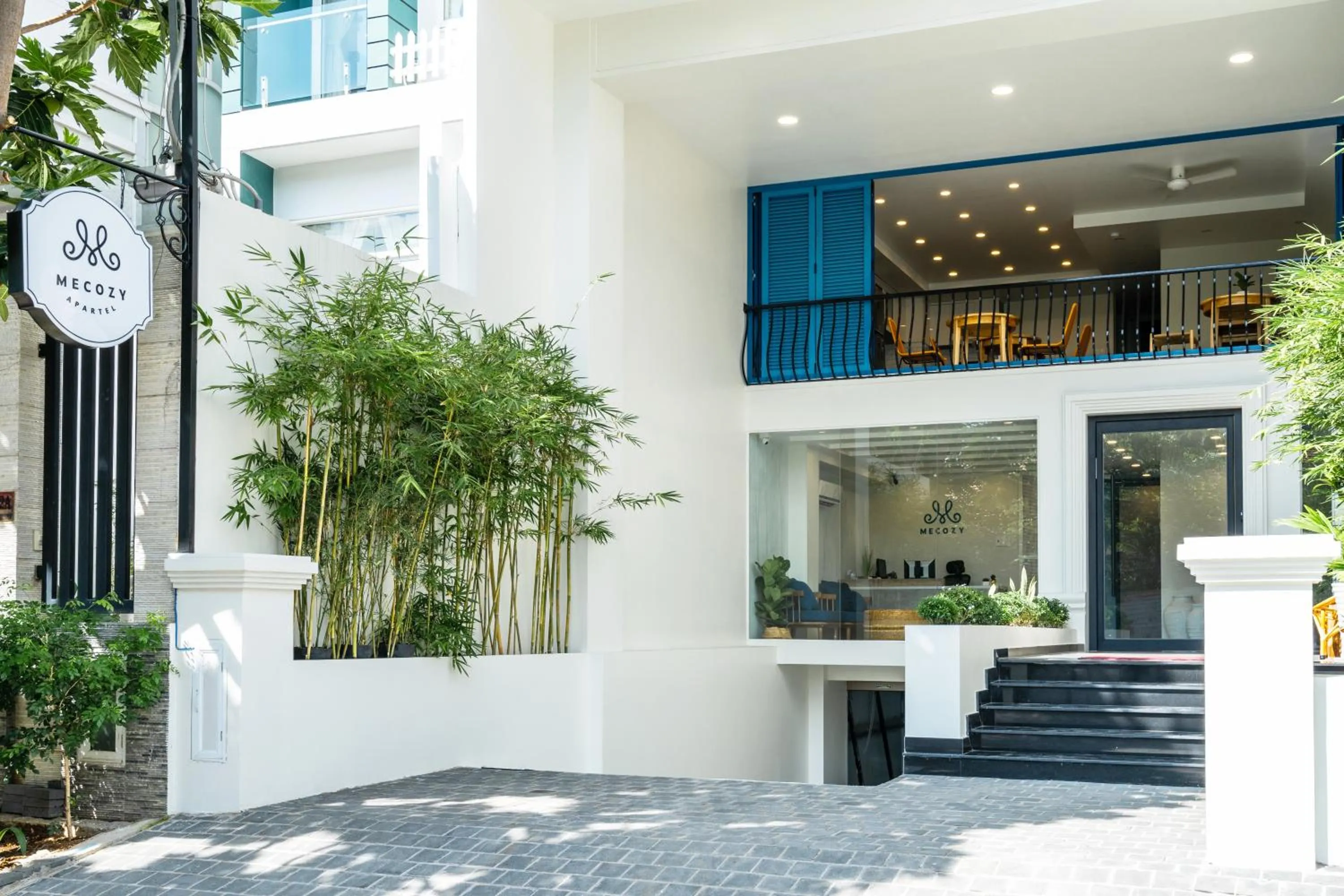 Property logo or sign in Mecozy Apartel