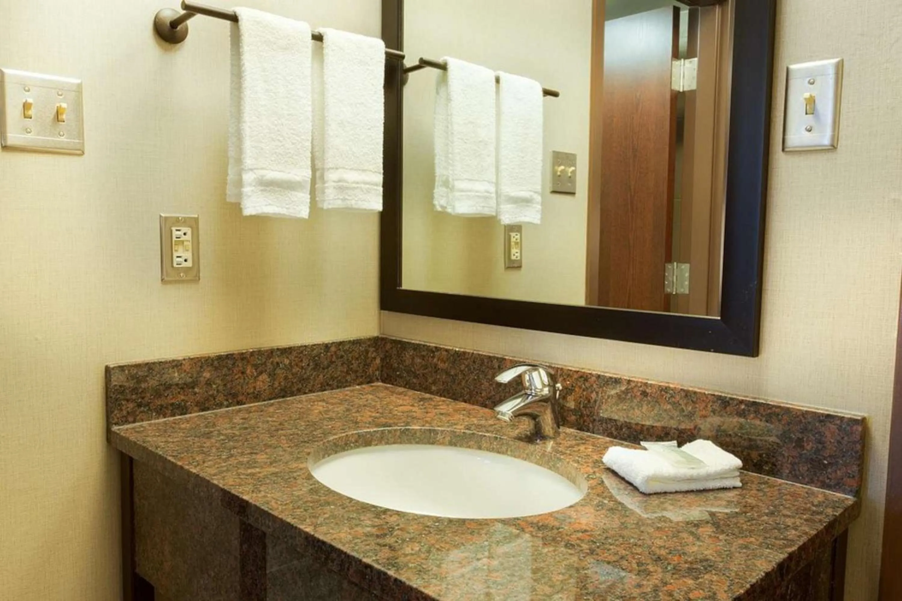 Bathroom in Heritage Inn & Suites San Antonio Airport, Trademark Wyndham