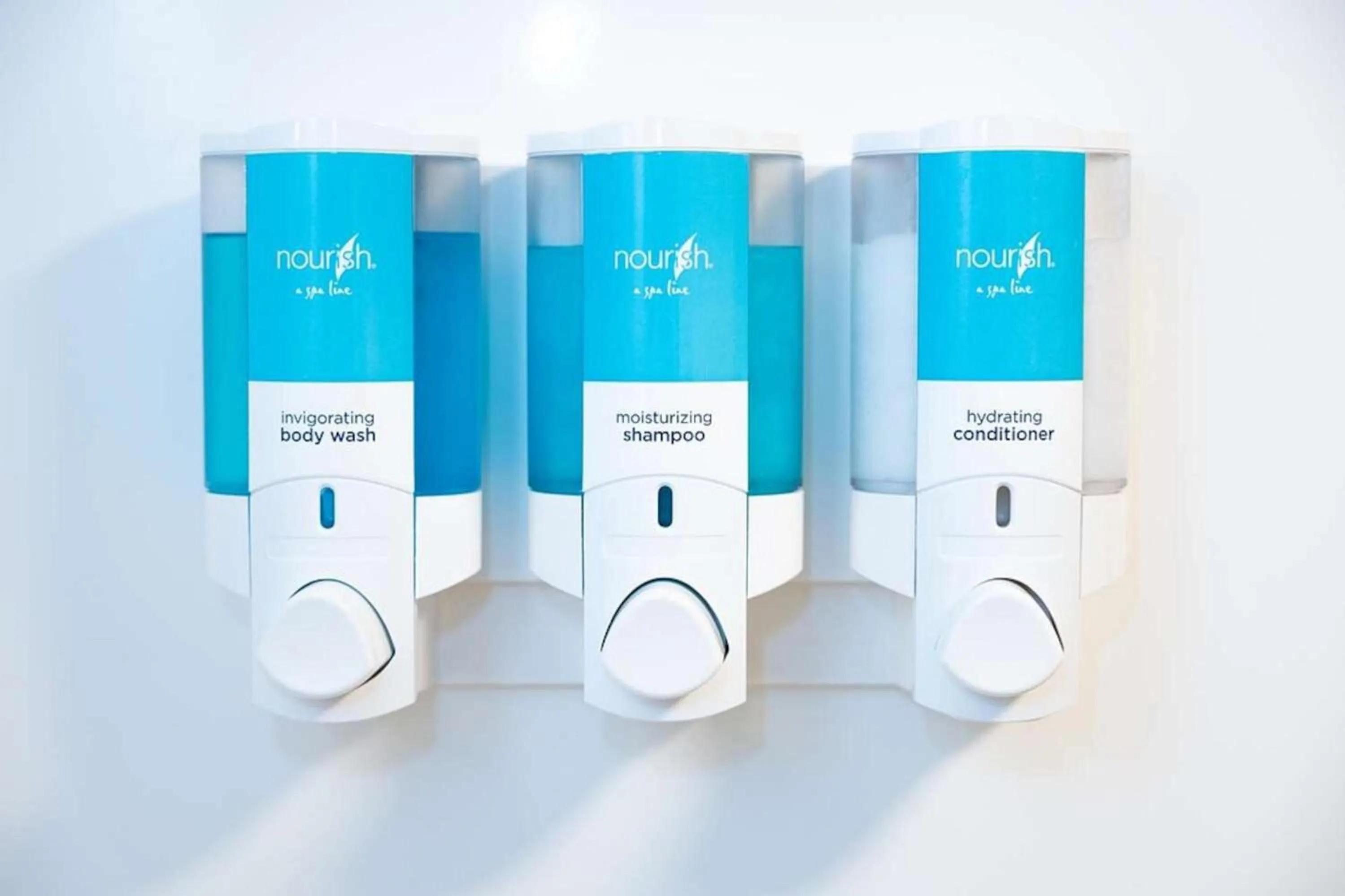 Bathroom in Heritage Inn & Suites San Antonio Airport, Trademark Wyndham