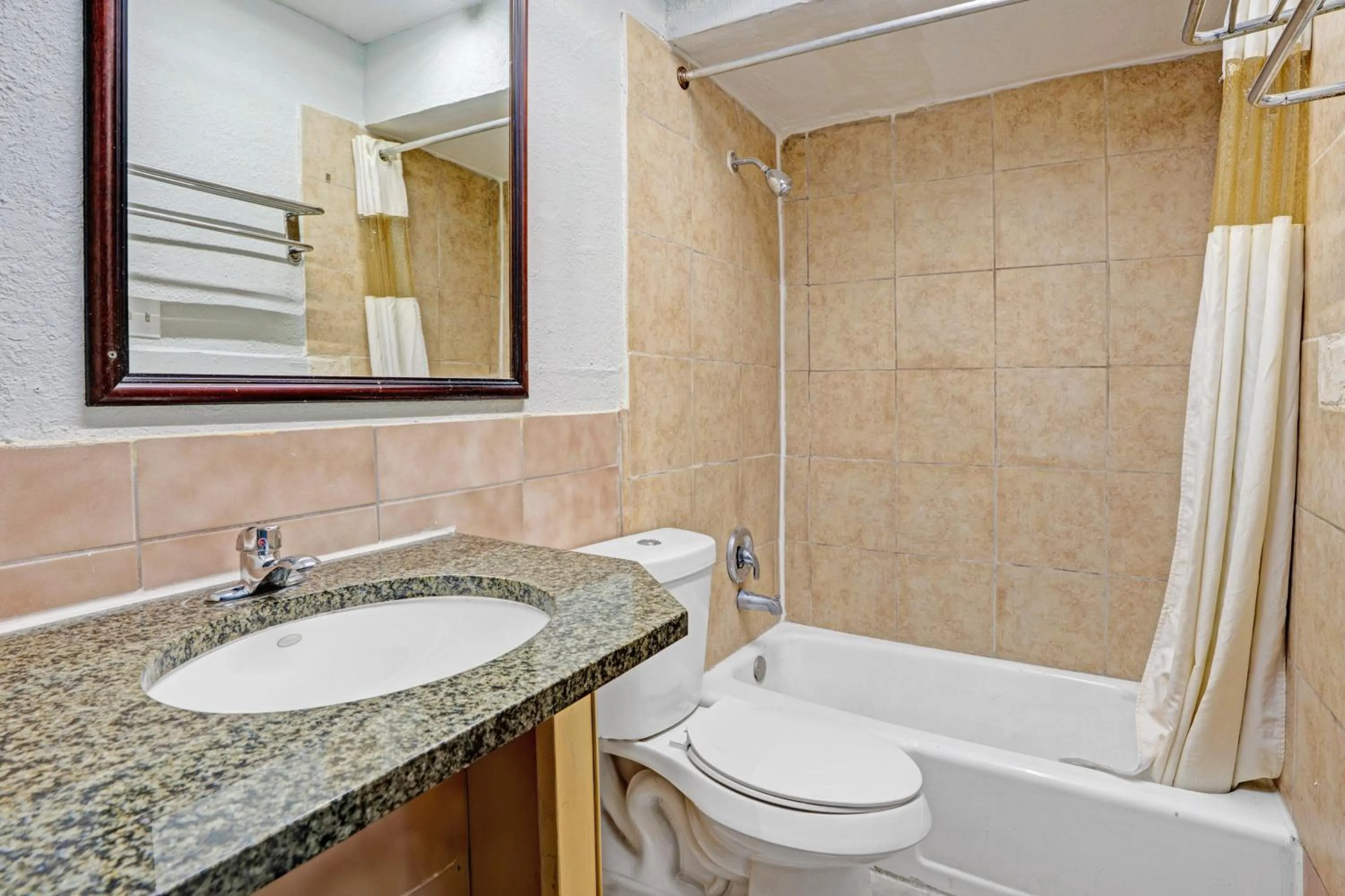 Bathroom in Super 7 Inn By OYO San Antonio NW Medical Center
