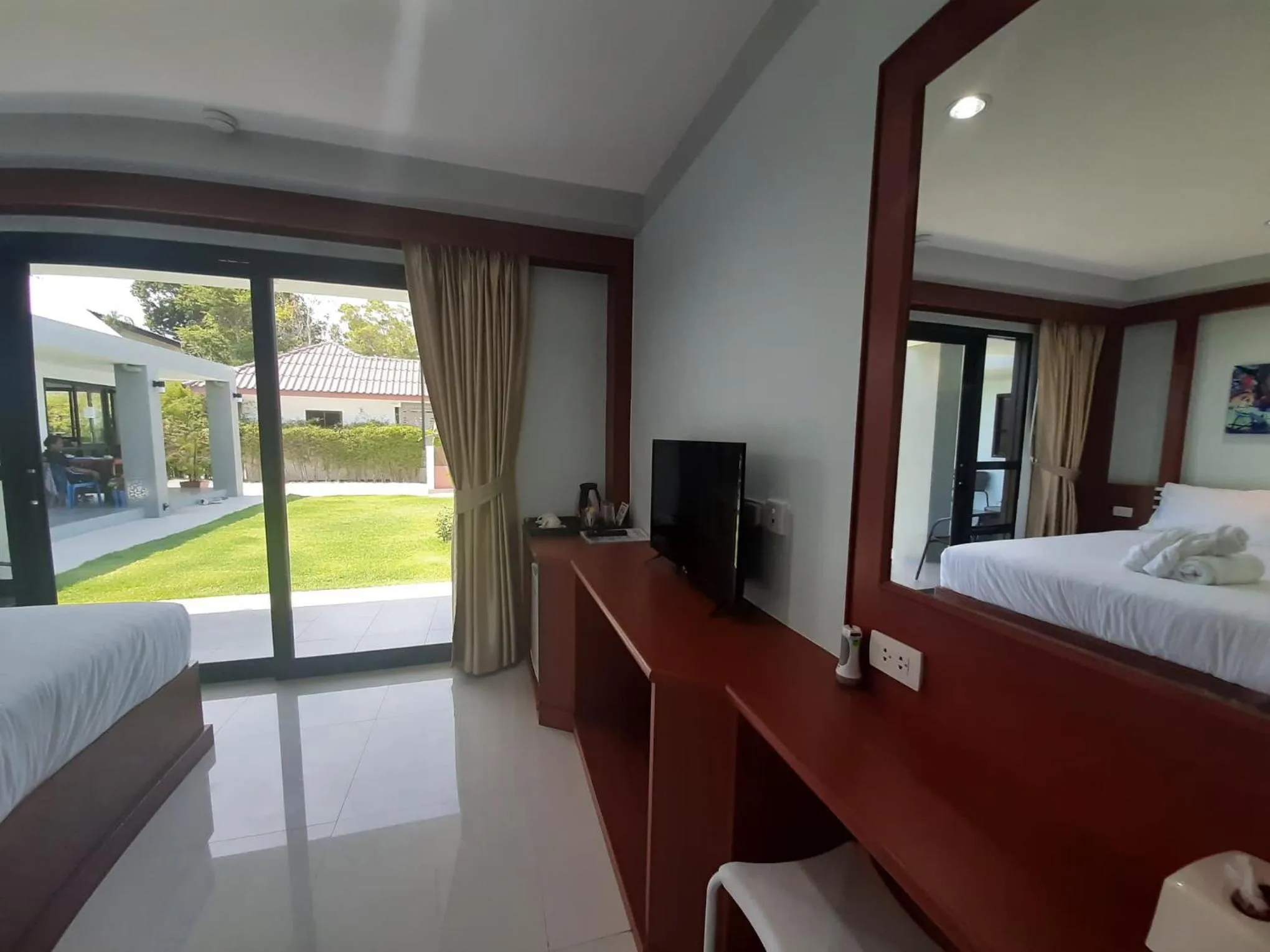 Garden view, Bed in CC Beach Resort