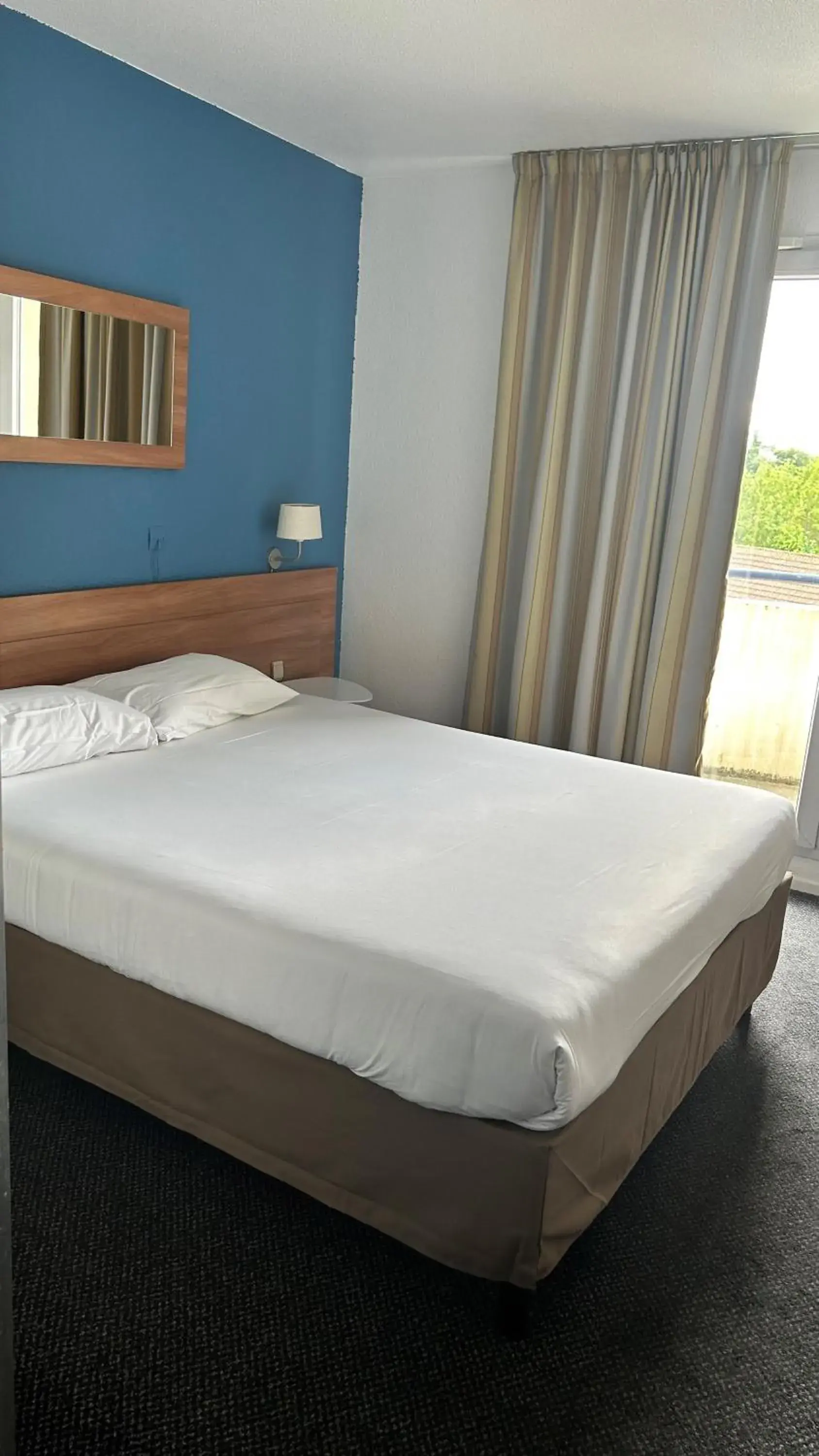 Bed in Kyriad Marne-La-Vallée Torcy Bed in Kyriad Marne-La-Vallée Torcy