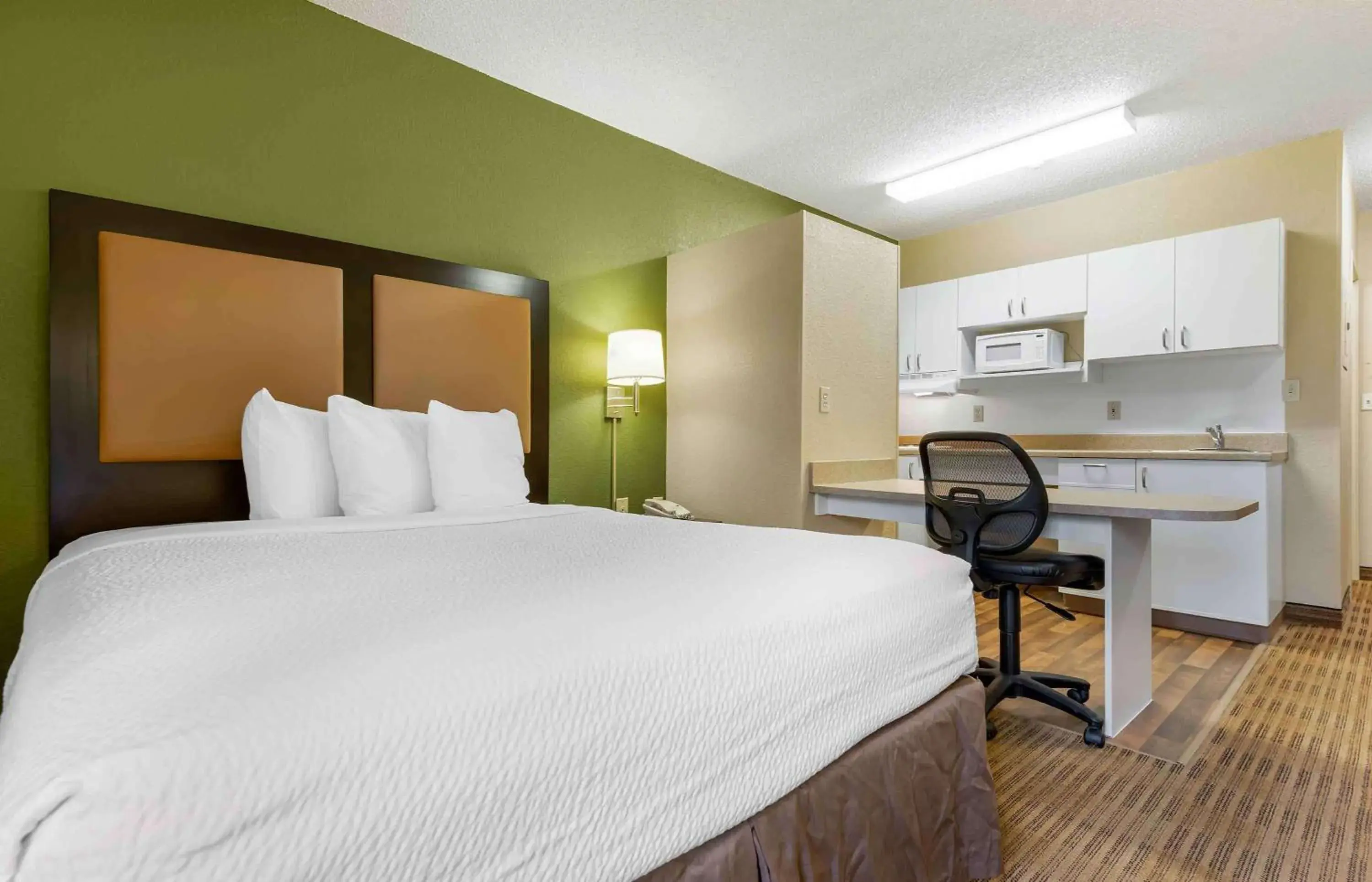 Bedroom, Bed in Extended Stay America Suites - Rochester - Greece Bedroom, Bed in Extended Stay America Suites - Rochester - Greece