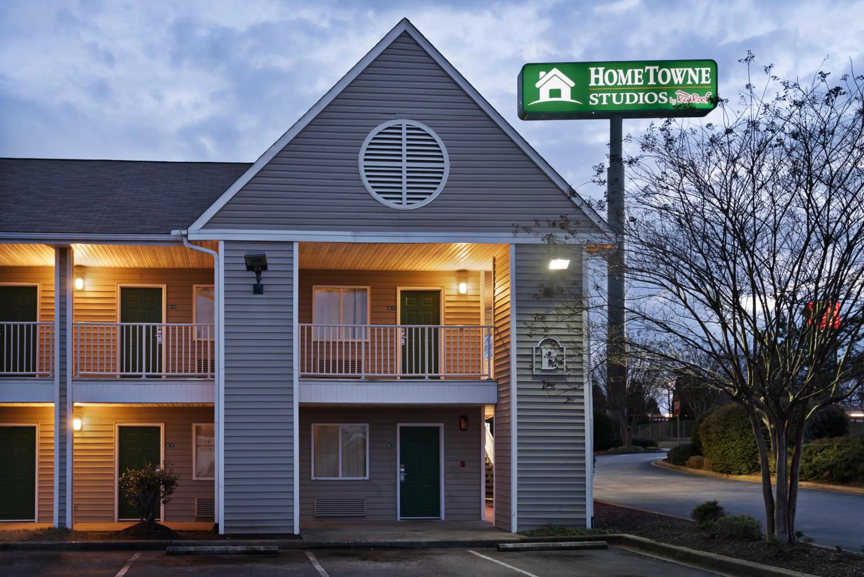 Property building in HomeTowne Studios by Red Roof Spartanburg - Asheville Highway