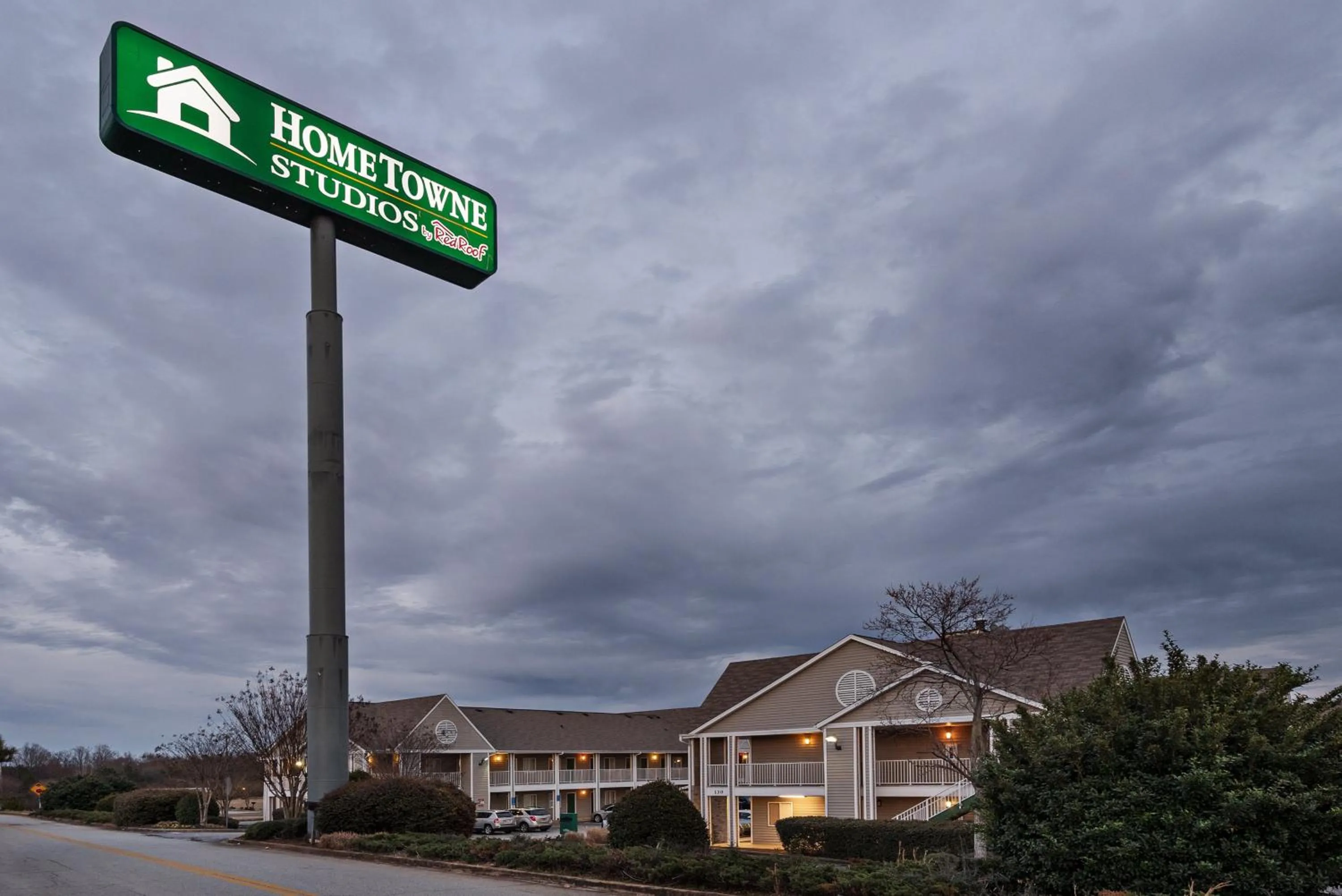 Property building in HomeTowne Studios by Red Roof Spartanburg - Asheville Highway