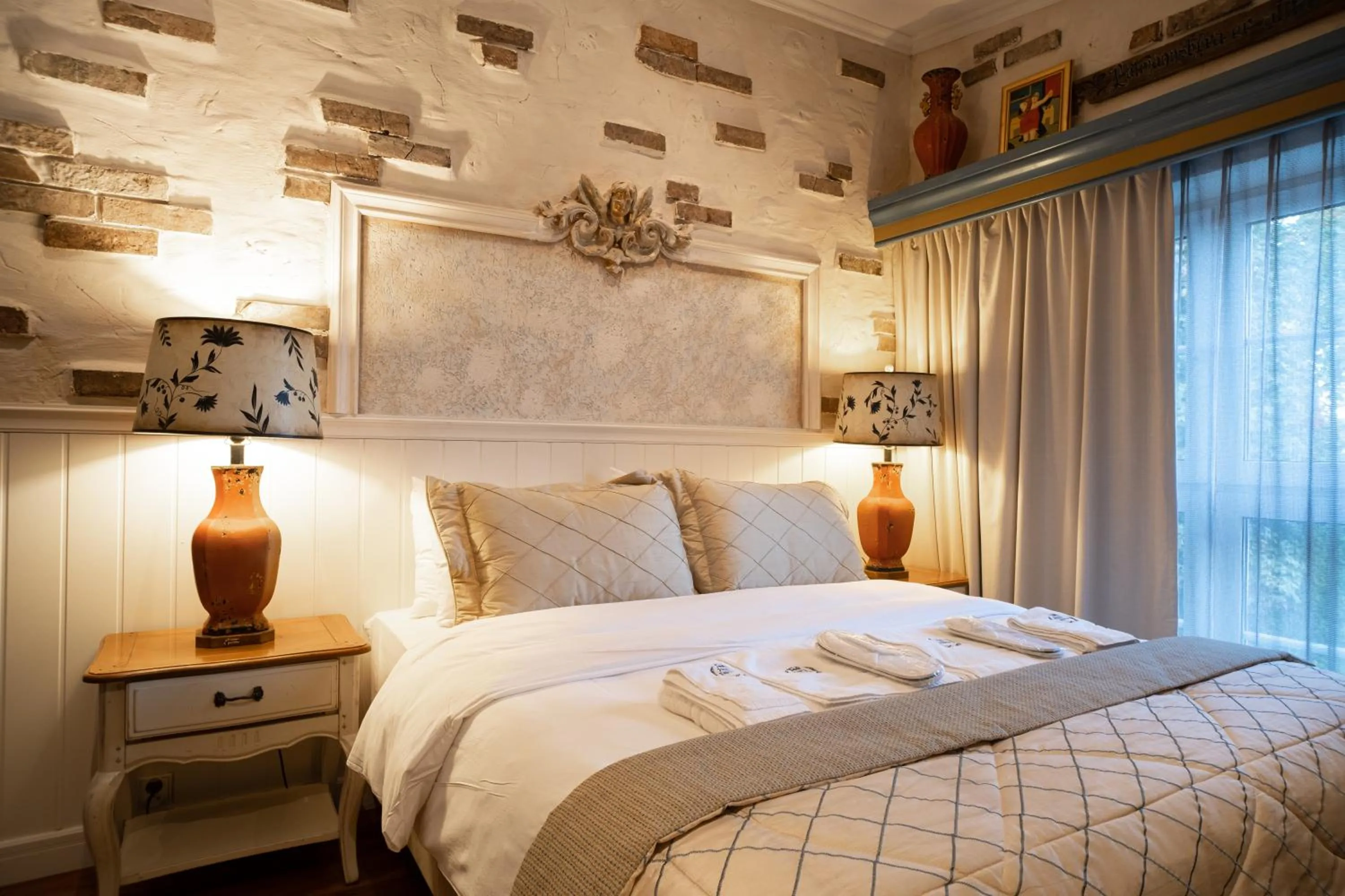 Bed in Paul's Fantasia Boutique Suites