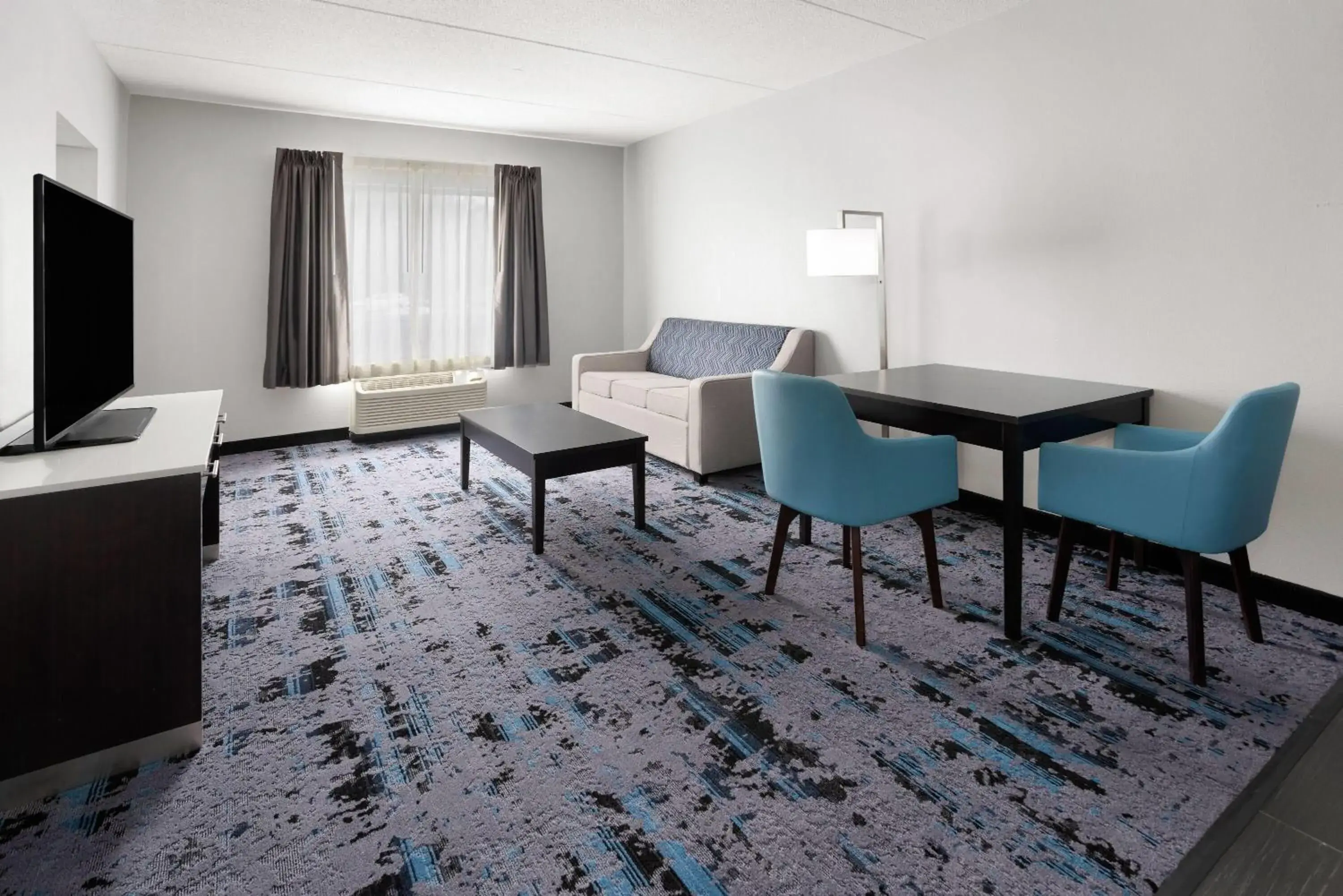 Living room in Hawthorn Extended Stay by Wyndham Chambersburg Living room in Hawthorn Extended Stay by Wyndham Chambersburg