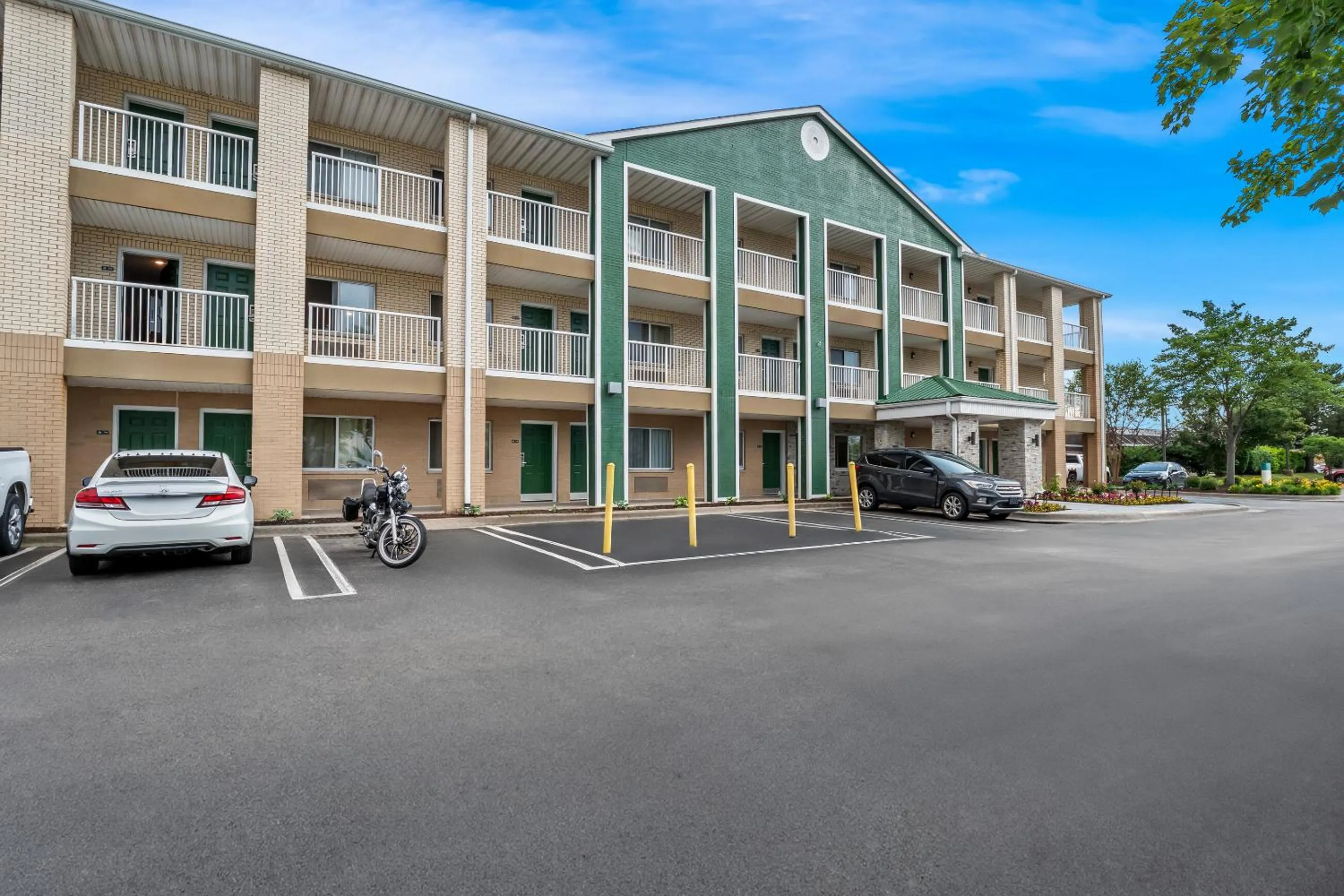 Property building in HomeTowne Studios by Red Roof Detroit - Livonia