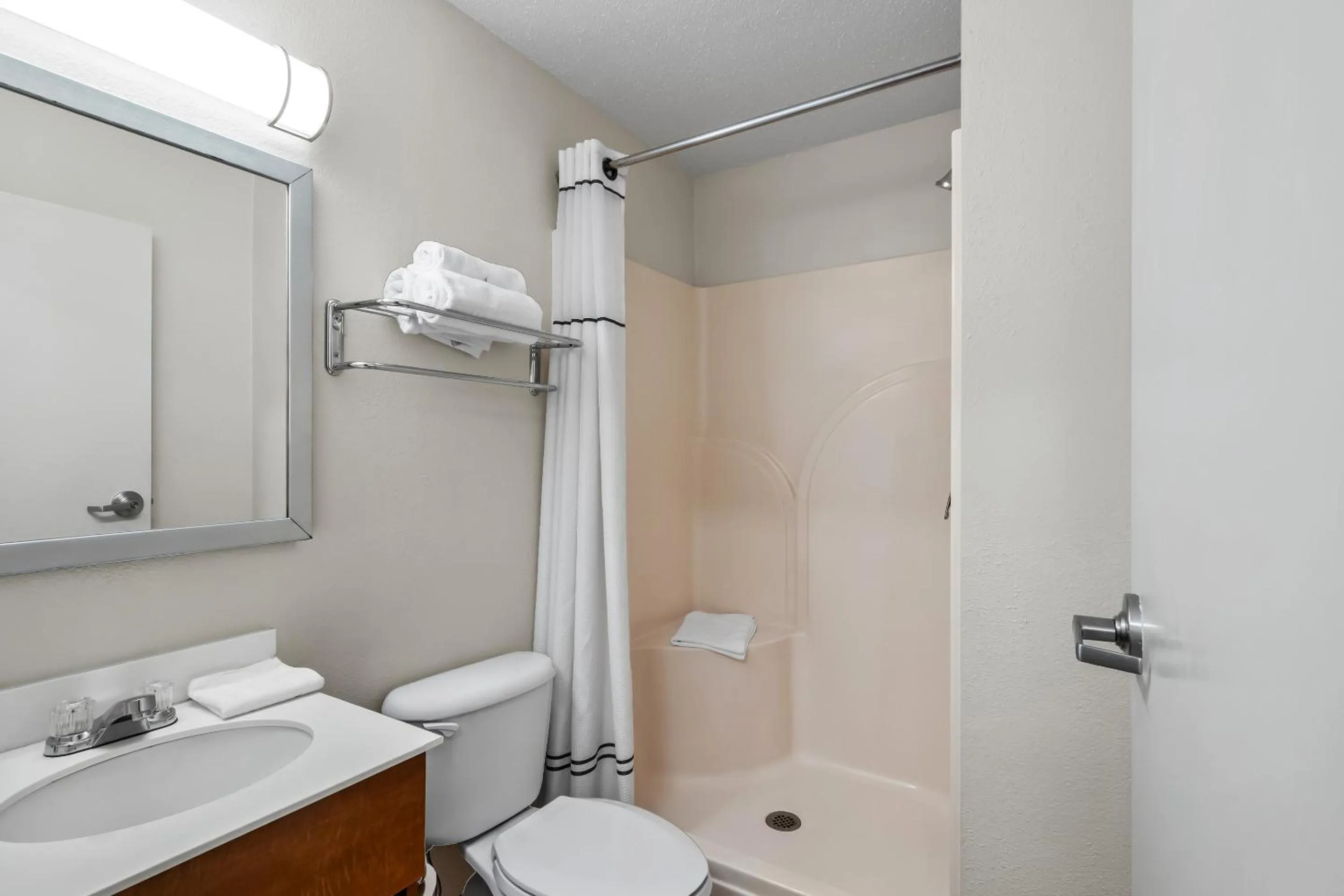 Bathroom in HomeTowne Studios by Red Roof Detroit - Livonia