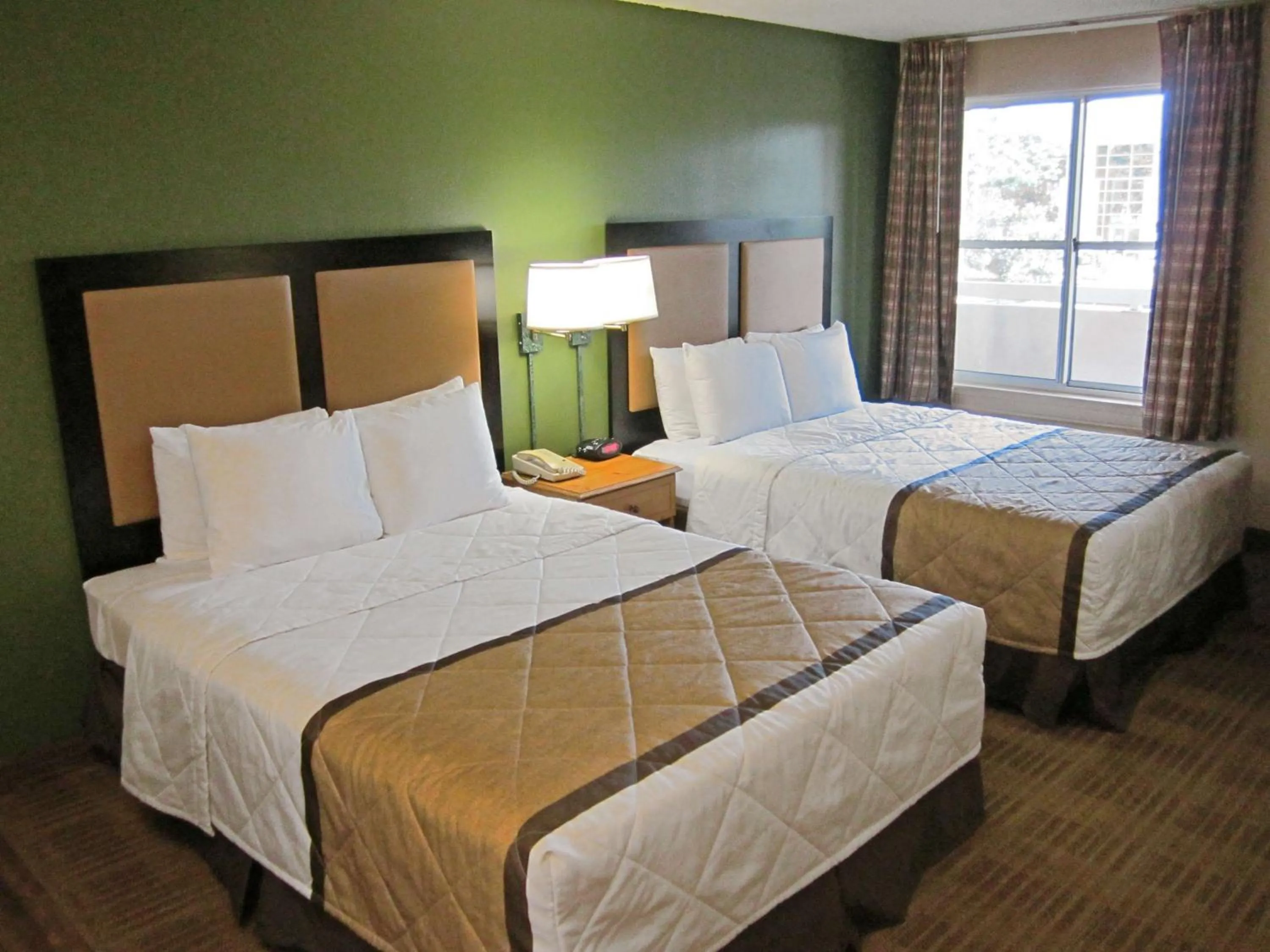 Bedroom in Extended Stay America Select Suites - Durham - University - Ivy Creek Blvd