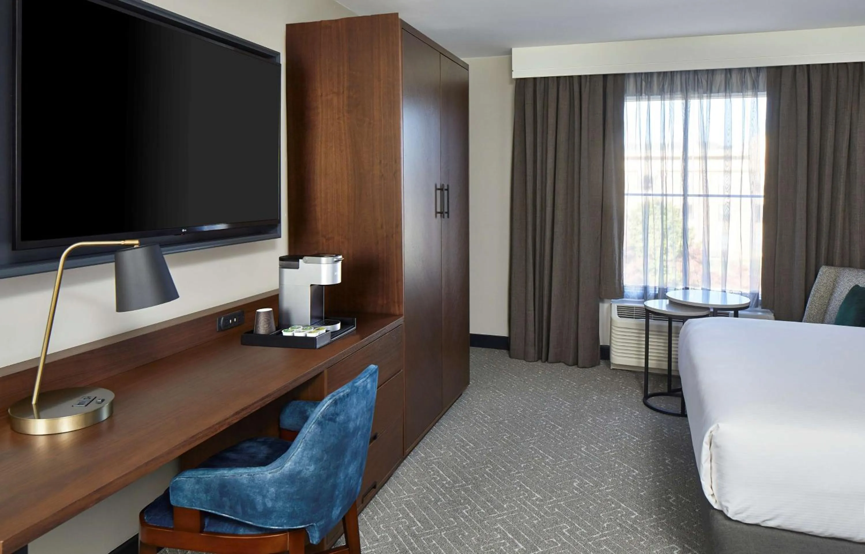 Bed in Cumberland House Knoxville, Tapestry Collection by Hilton