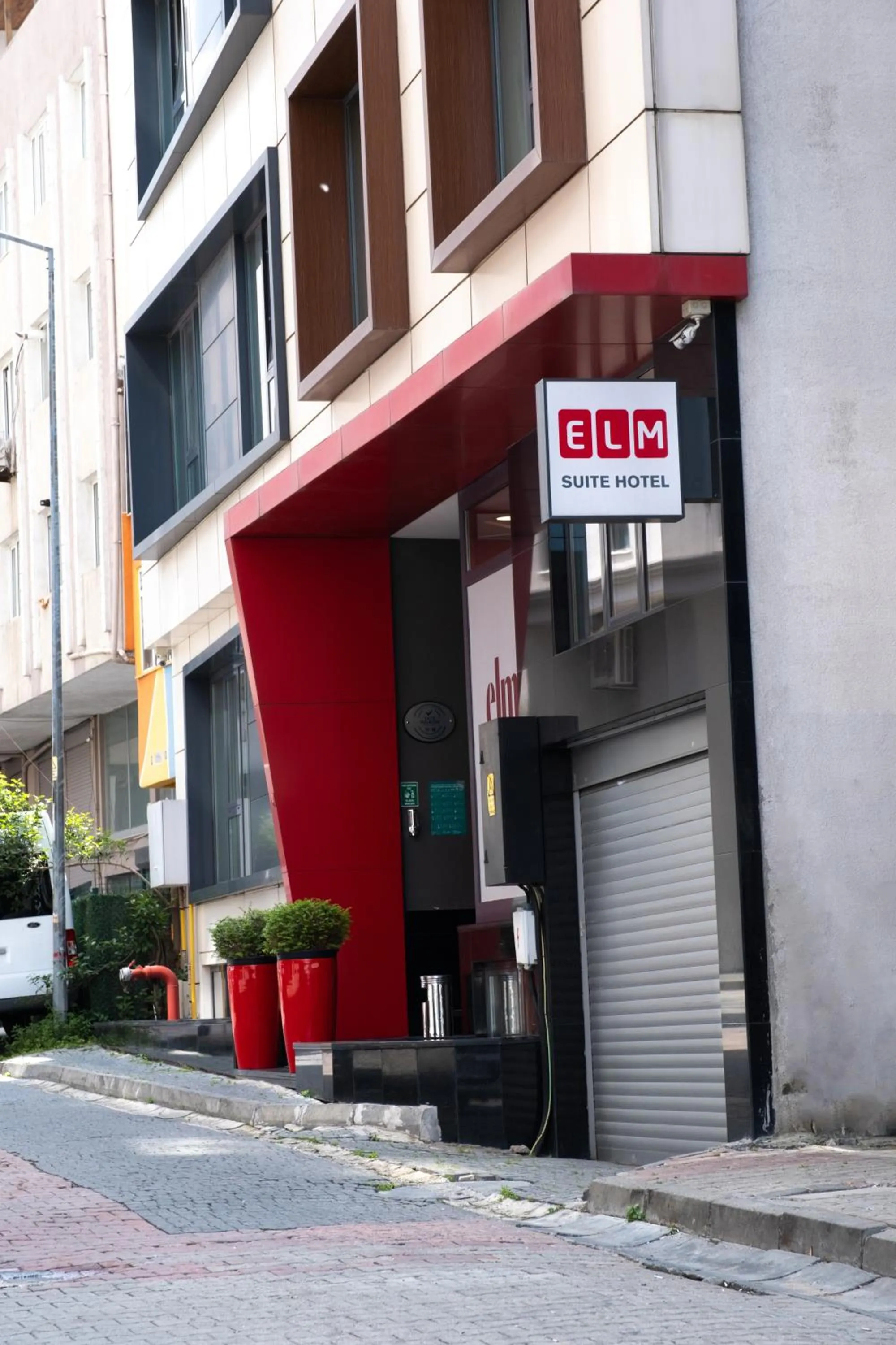 Property building in Elm Suite Hotel