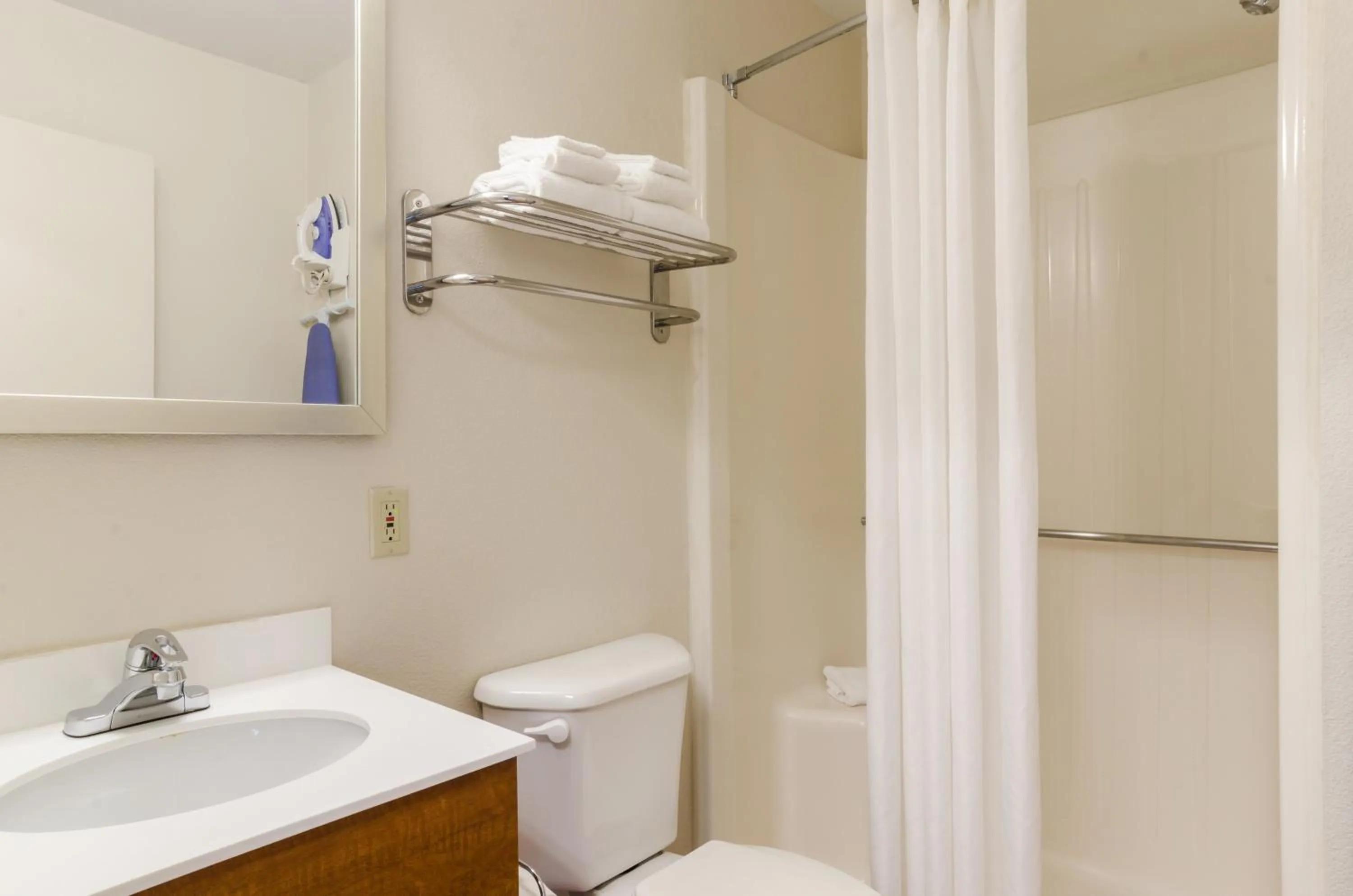 Bathroom in HomeTowne Studios by Red Roof Denver - Glendale/ Cherry Creek