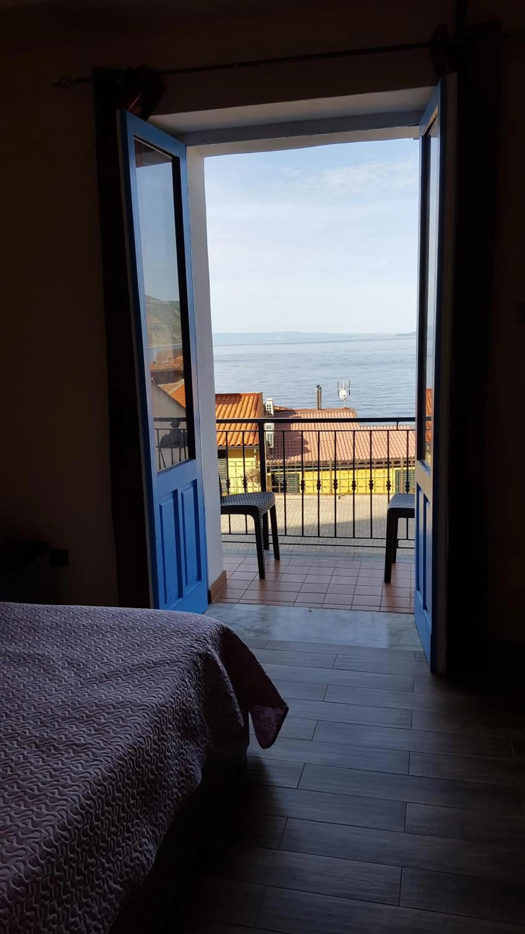 Bed in seaside room
