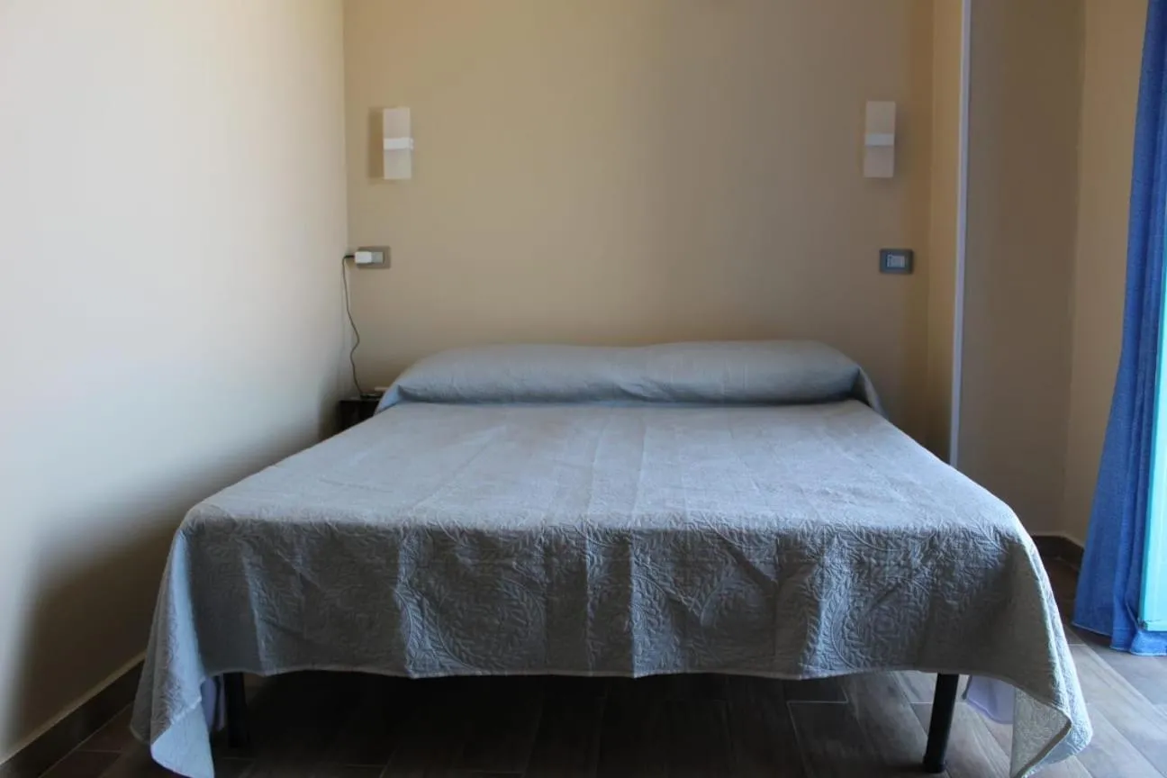 Bed in seaside room