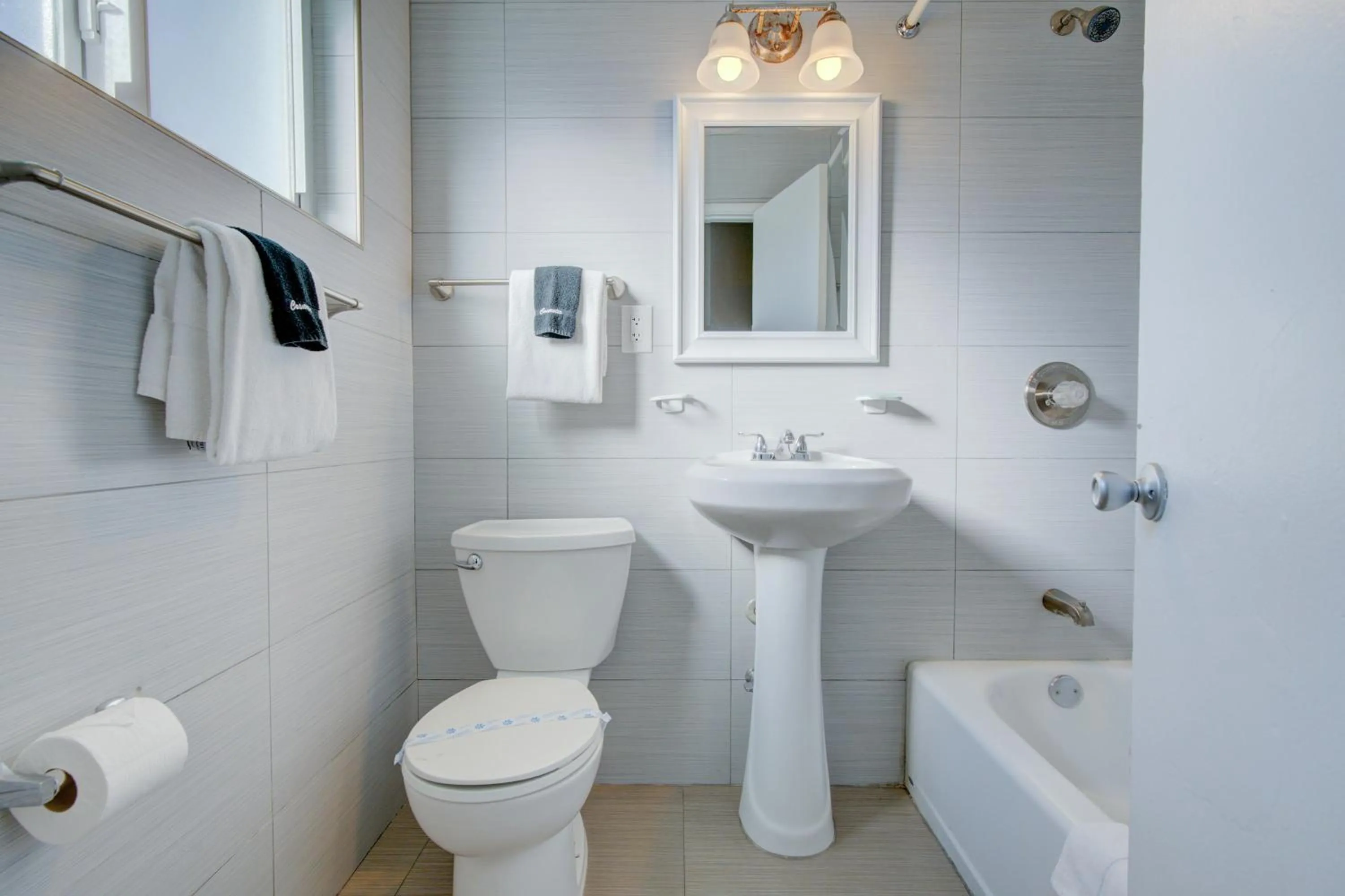 Bathroom in Leeward Motel By Capital O North Miami Beachside