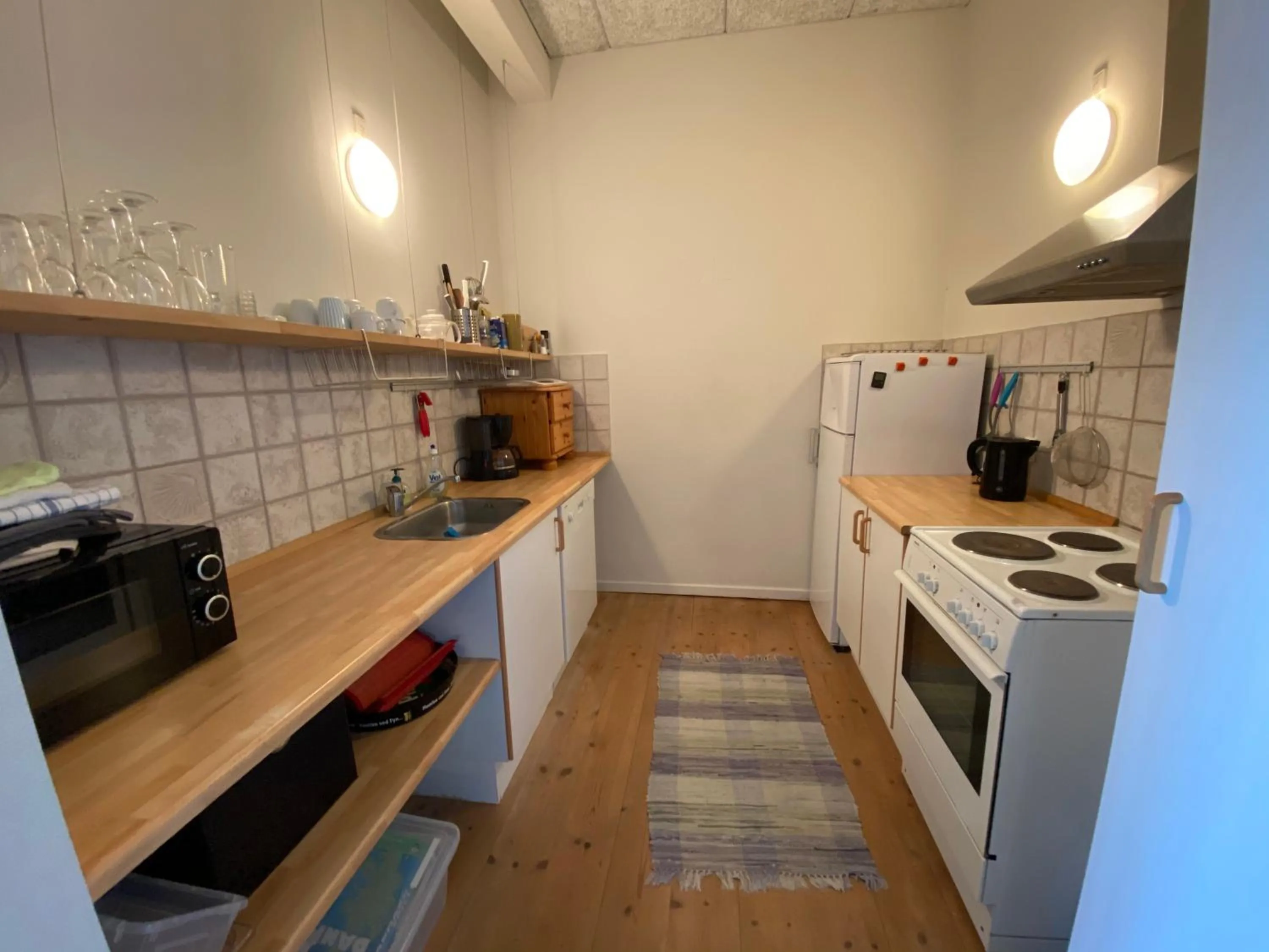 Kitchen or kitchenette in Skærven Beachfront Apartments and Cottage