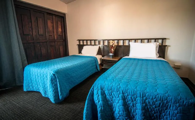 Bed in Hotel Suites Malena
