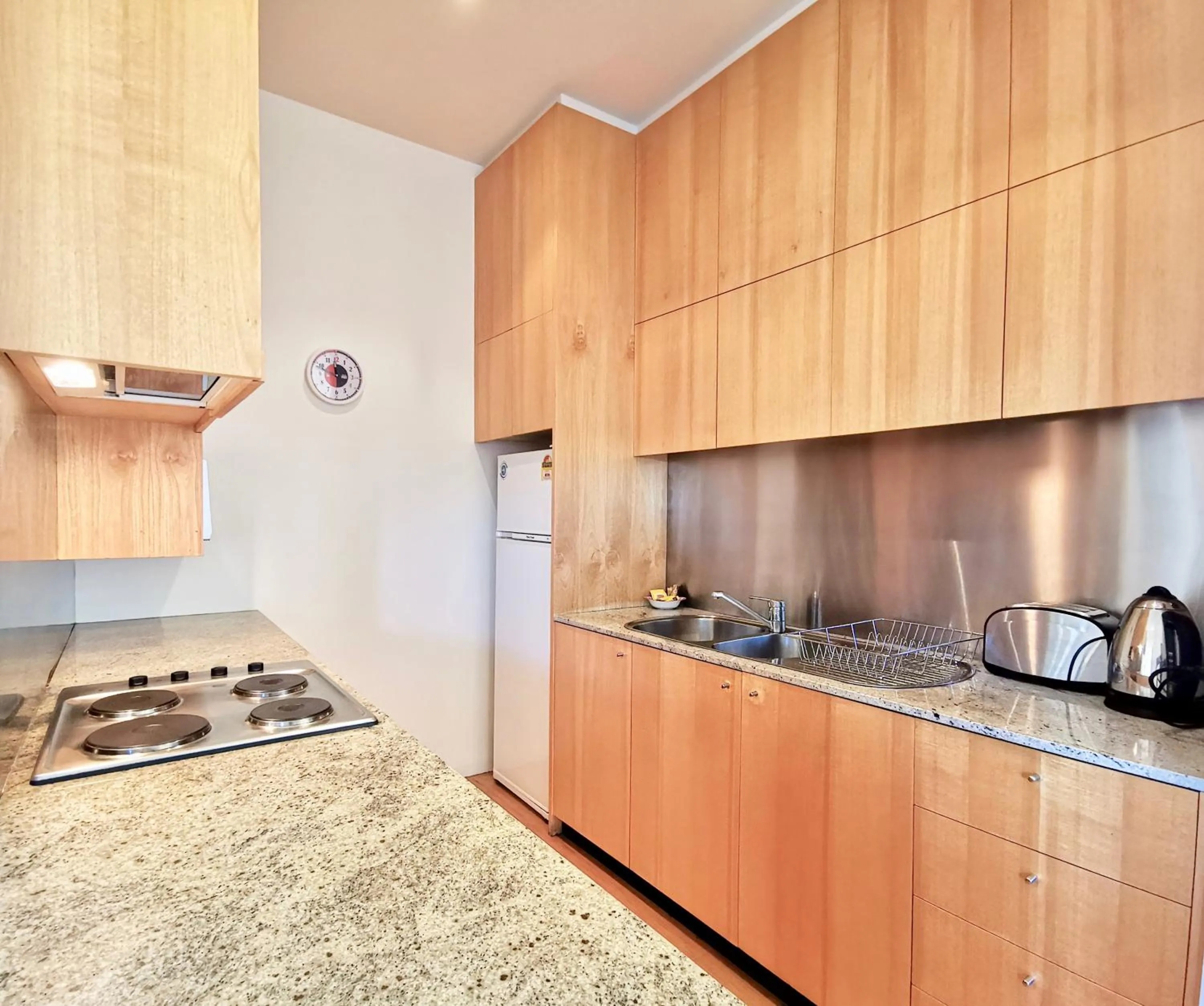 Kitchen or kitchenette in Phoenix Apartments
