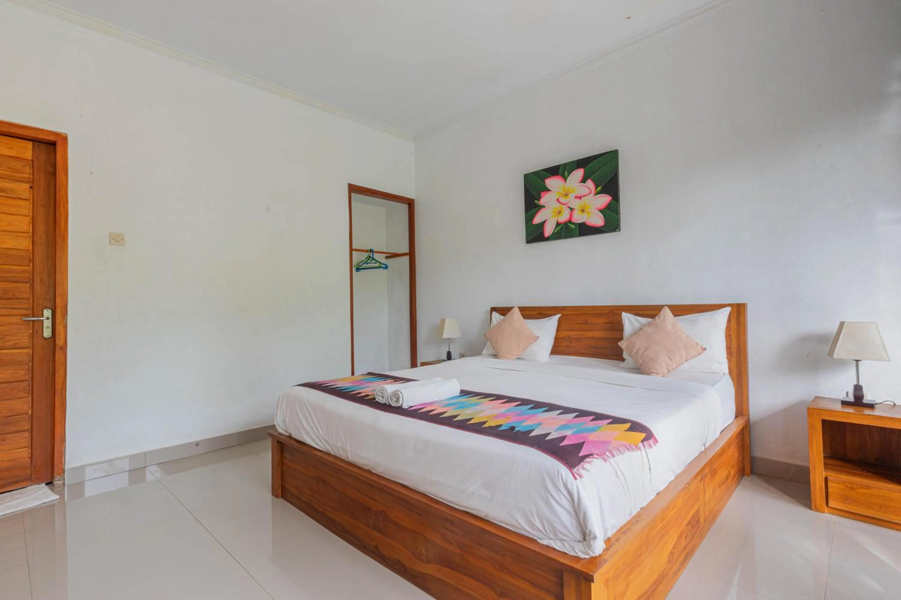 Bed in Bhavana Cottage