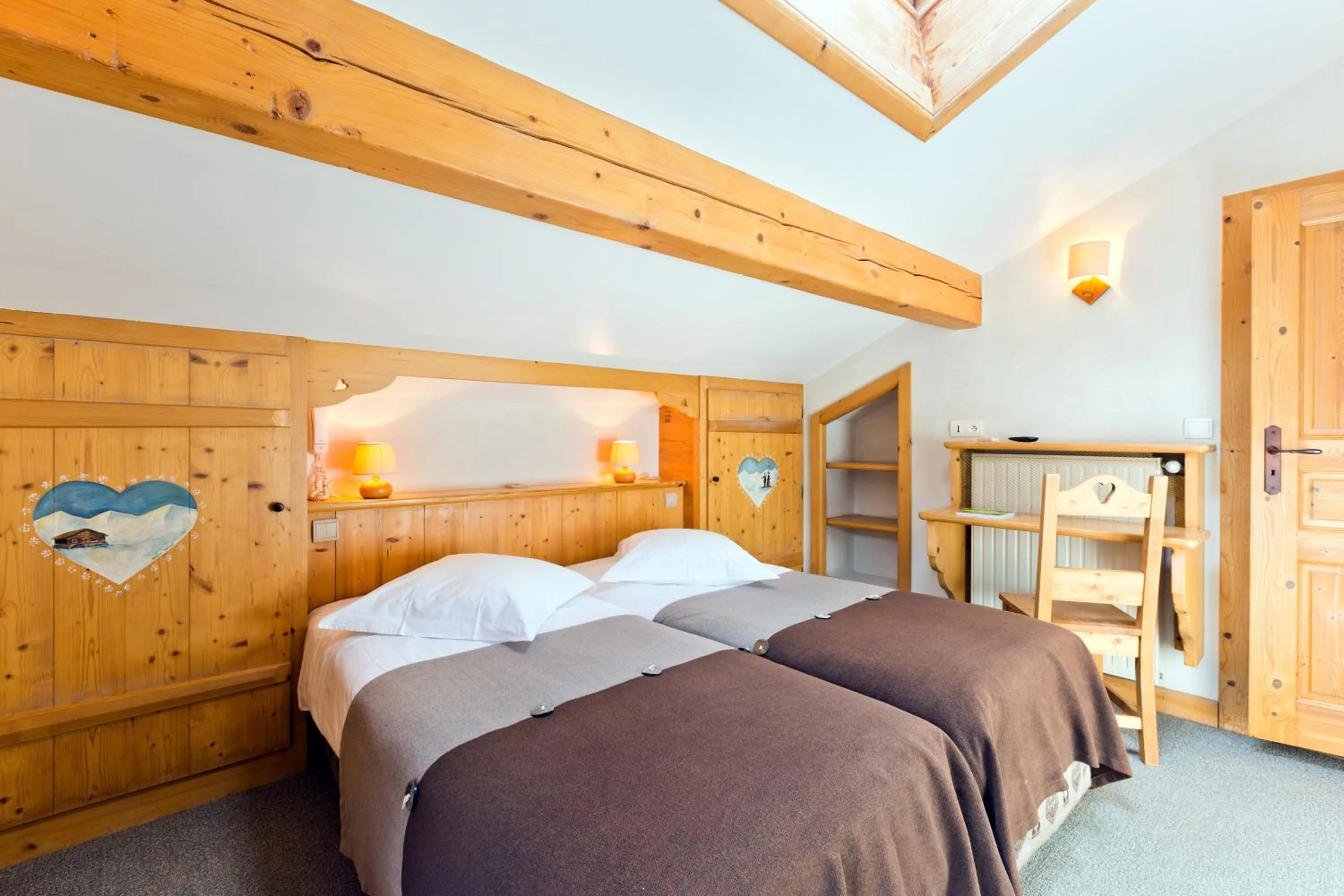 Bed in Logis La Croix-Saint-Maurice