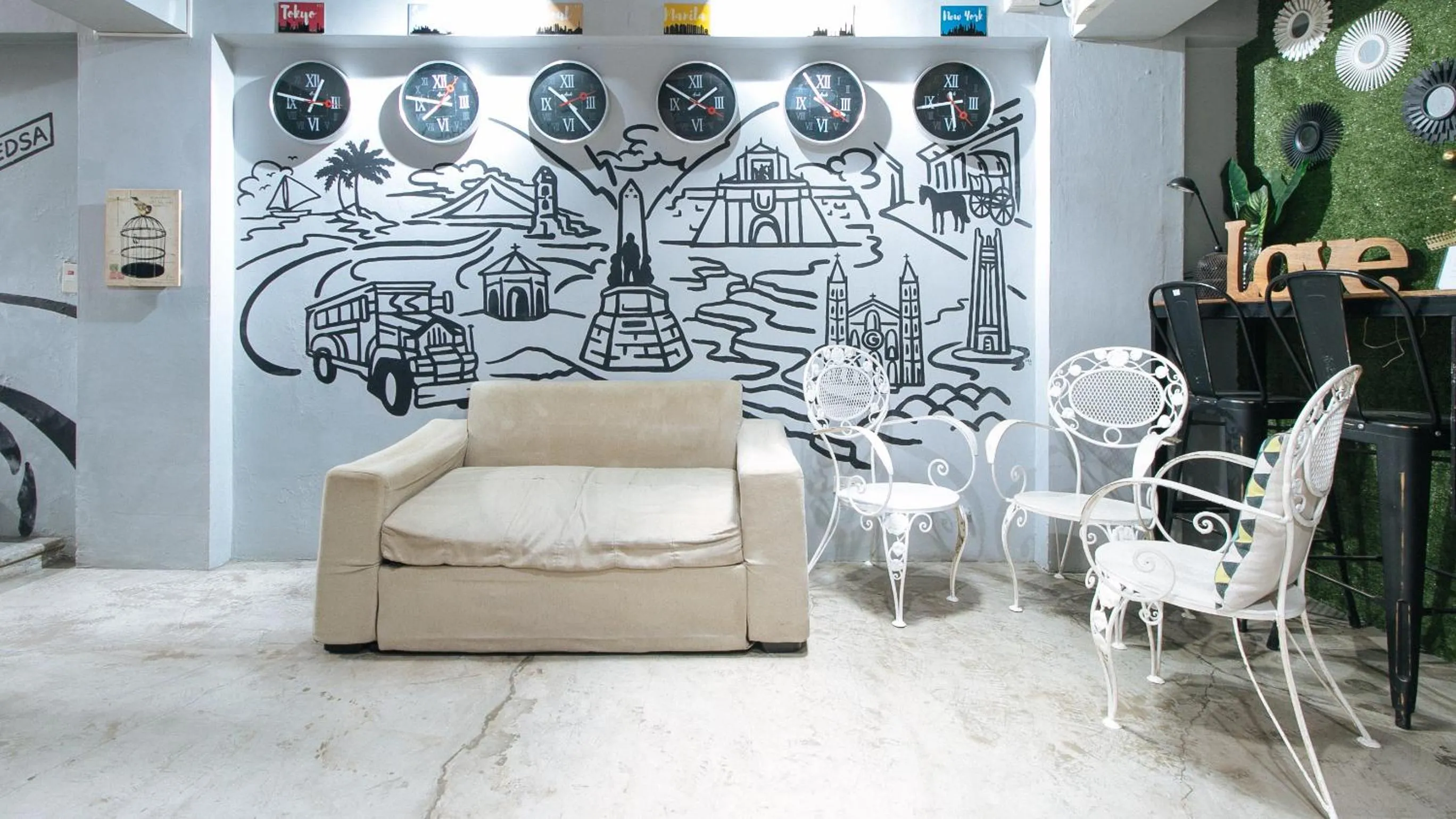 Seating area in RedDoorz Plus at BGC near St Lukes