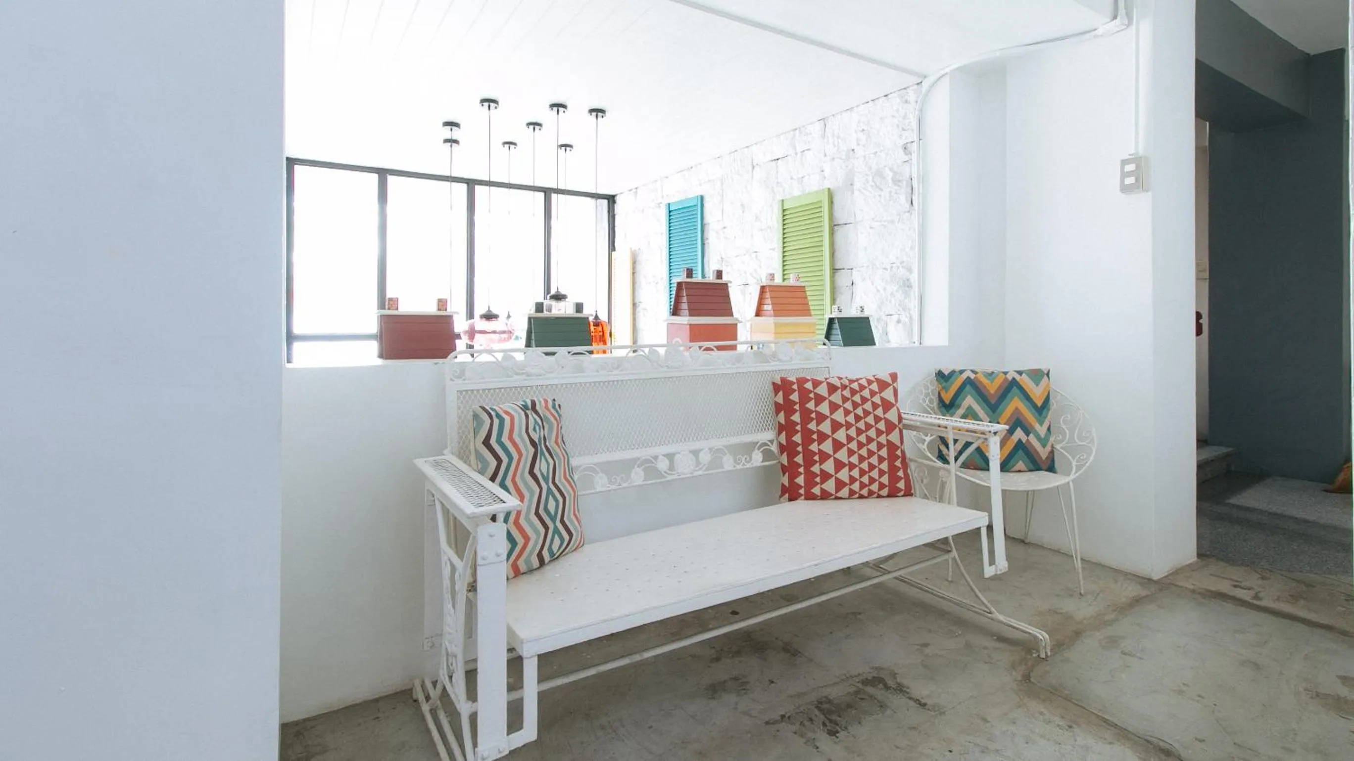 Seating area, Bed in RedDoorz Plus at BGC near St Lukes