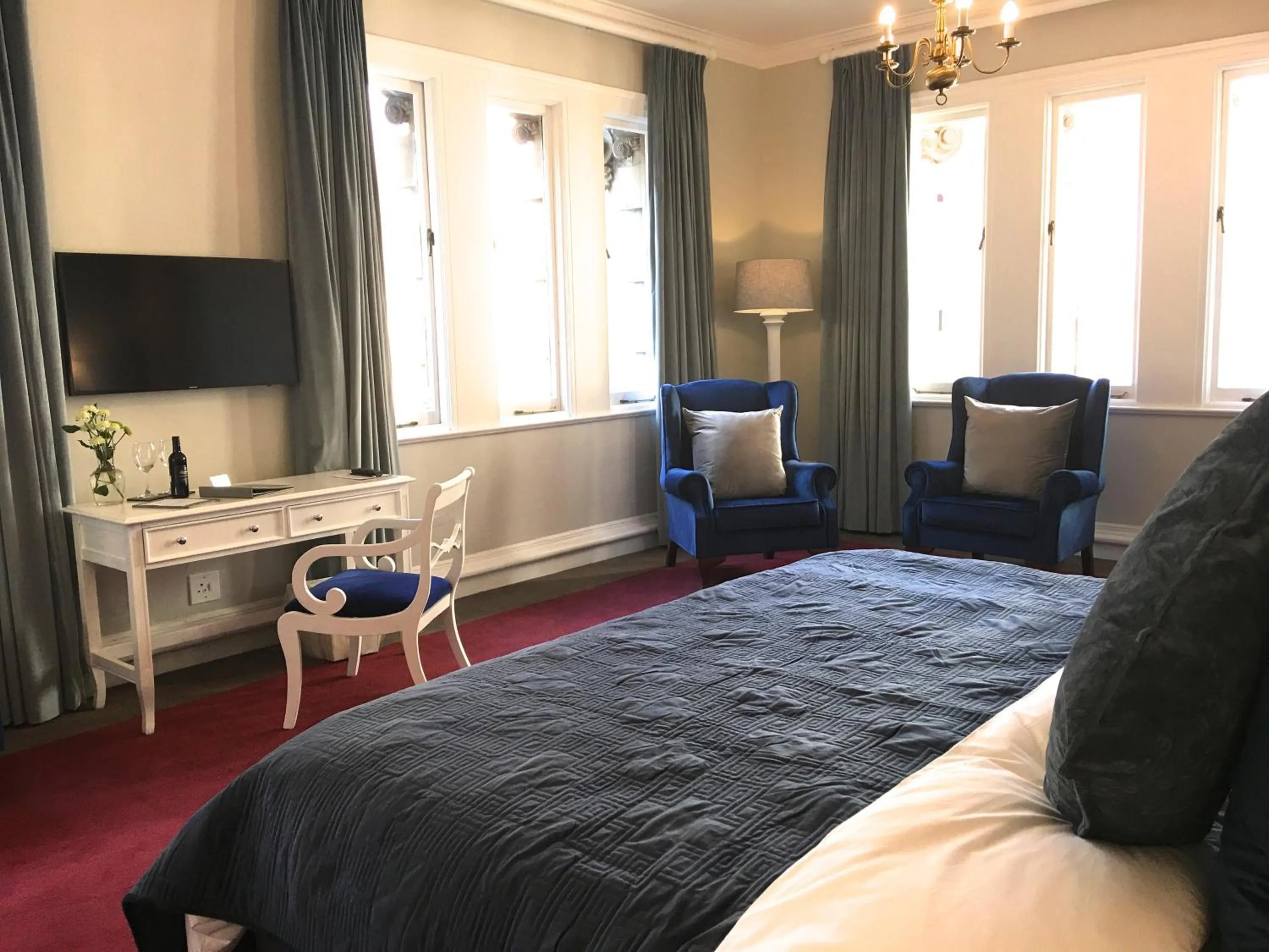 Bed in Rand Club Suites