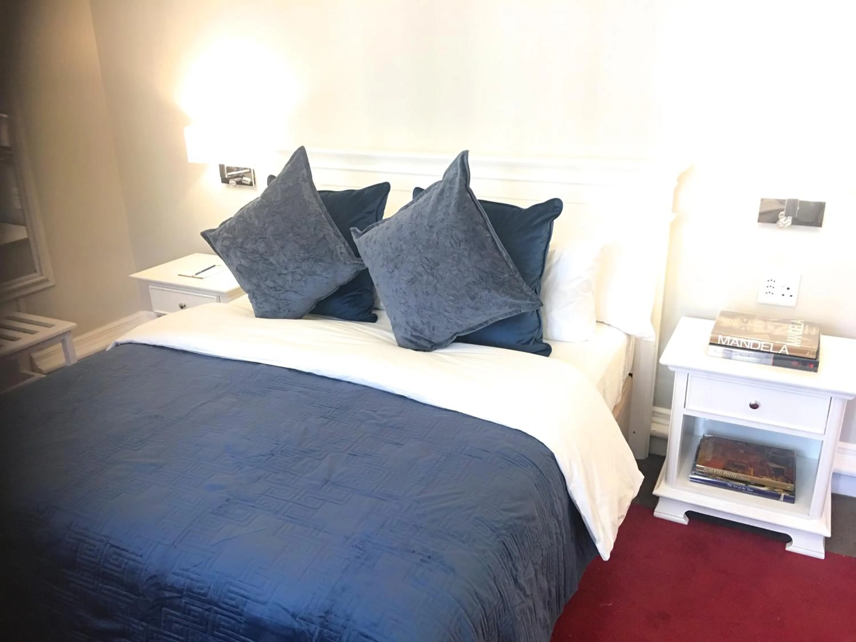 Bed in Rand Club Suites