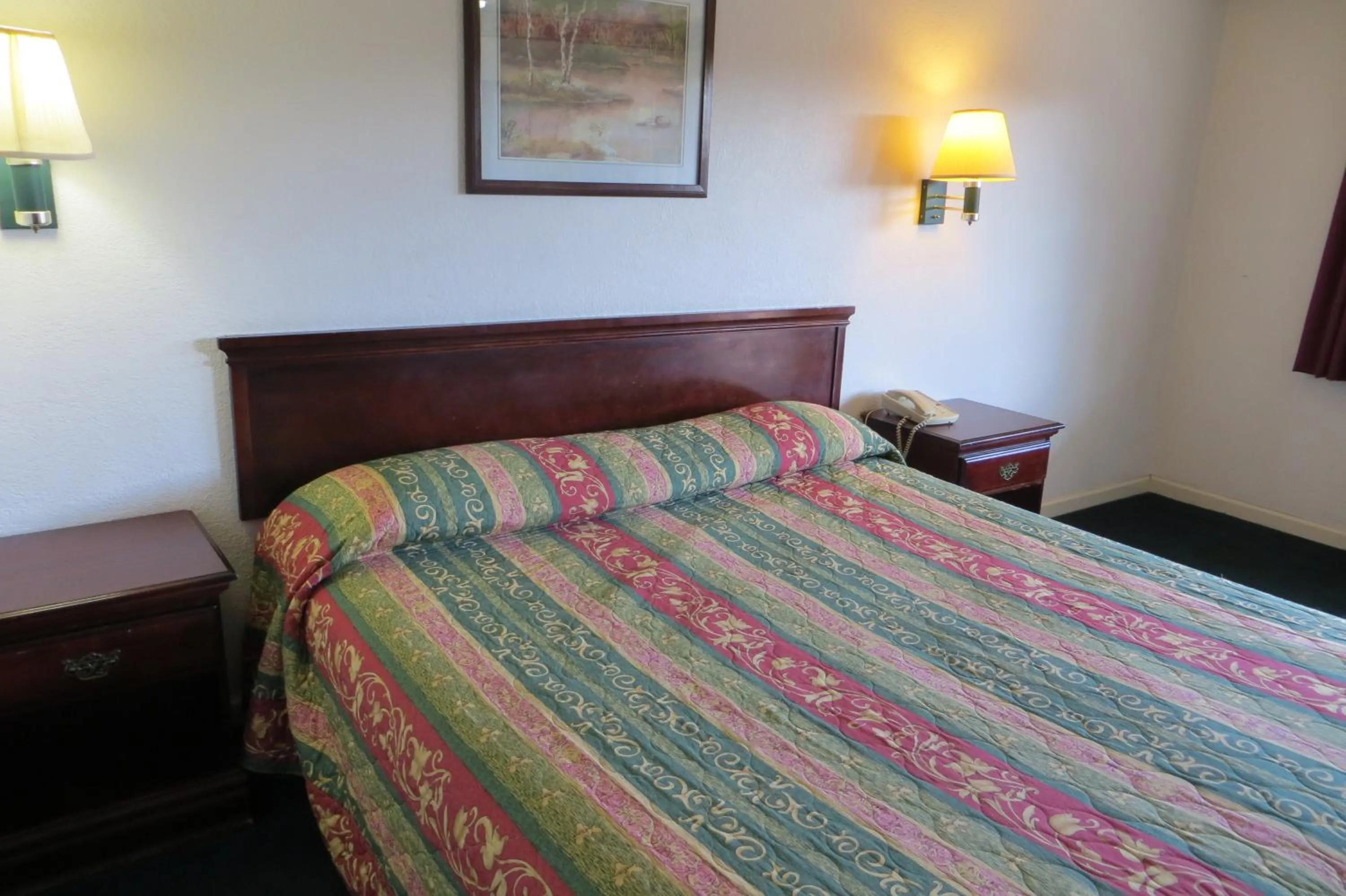 Bed in Capri Motel