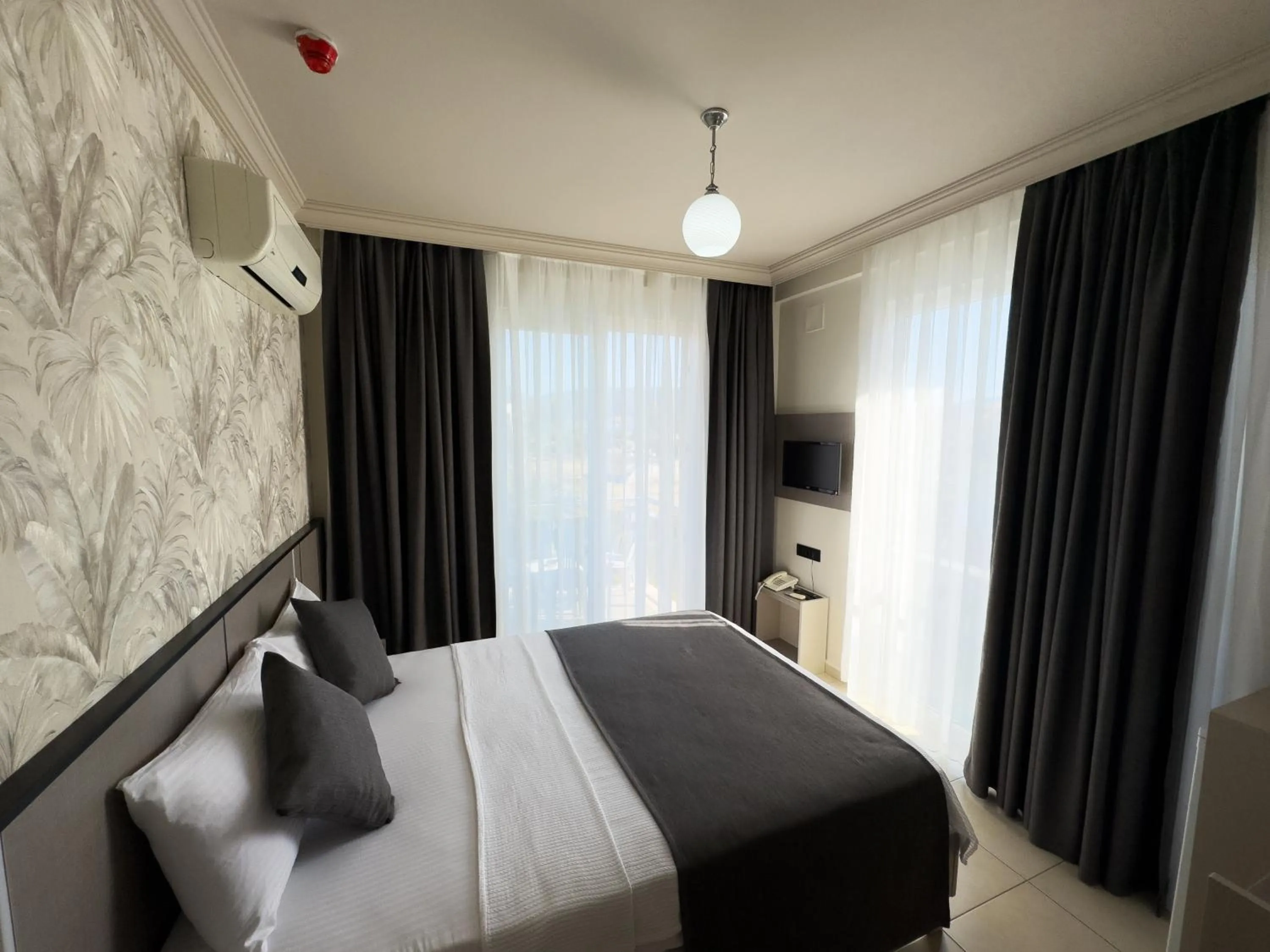 Bed in Sardunya Hotel