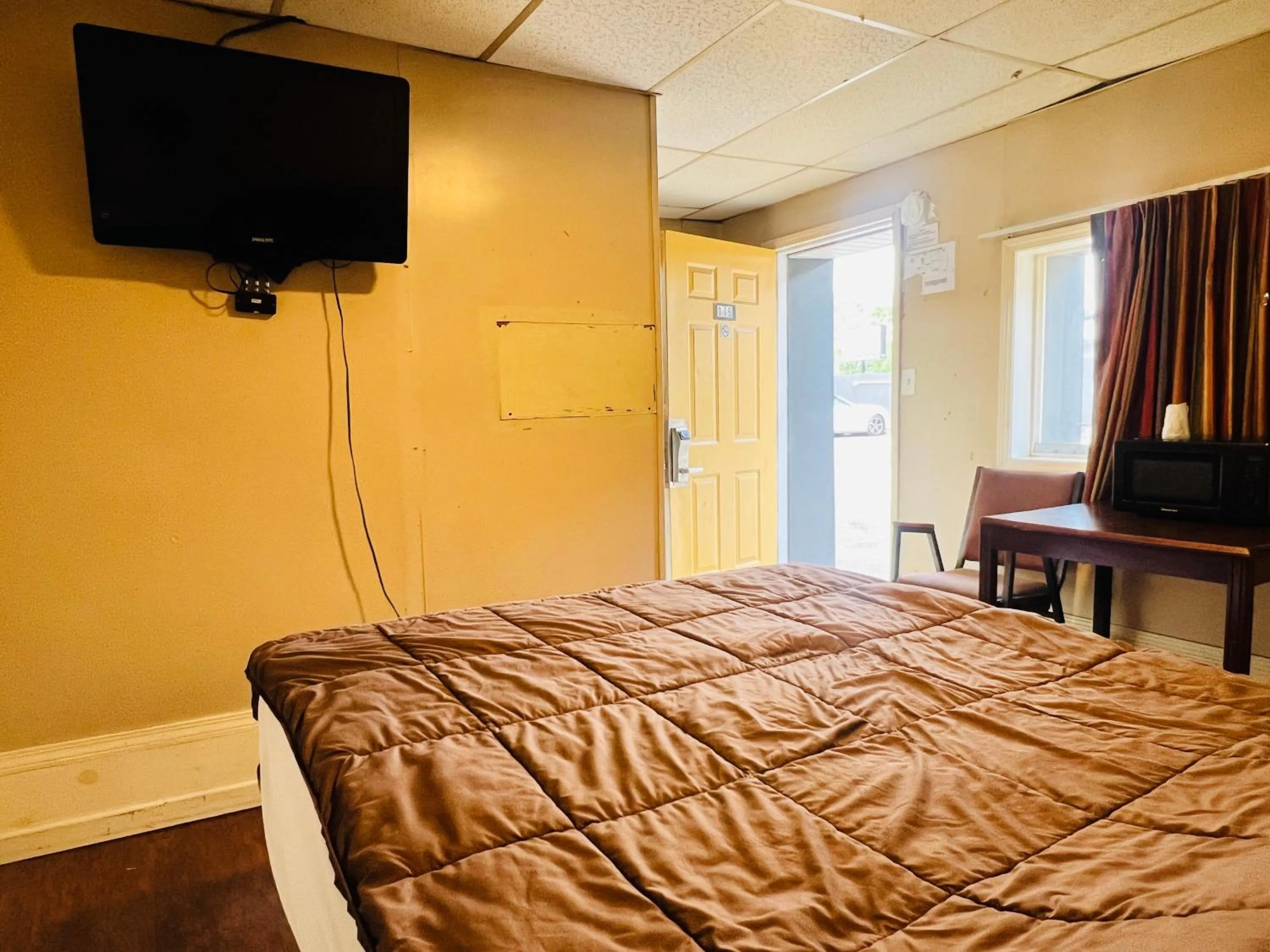 Bedroom in Hotel O East Hemphill Burton-Flint