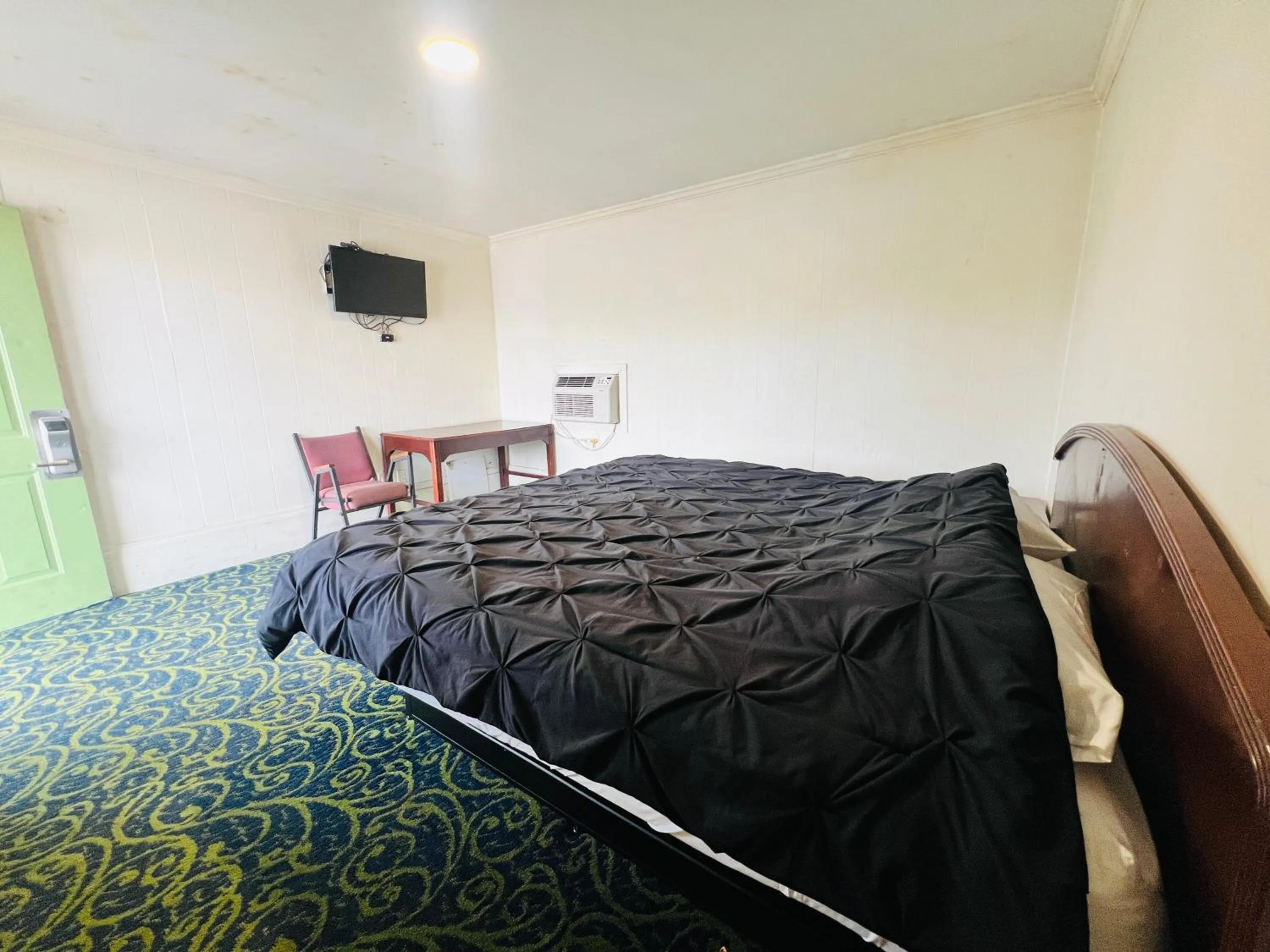 Bedroom in Hotel O East Hemphill Burton-Flint