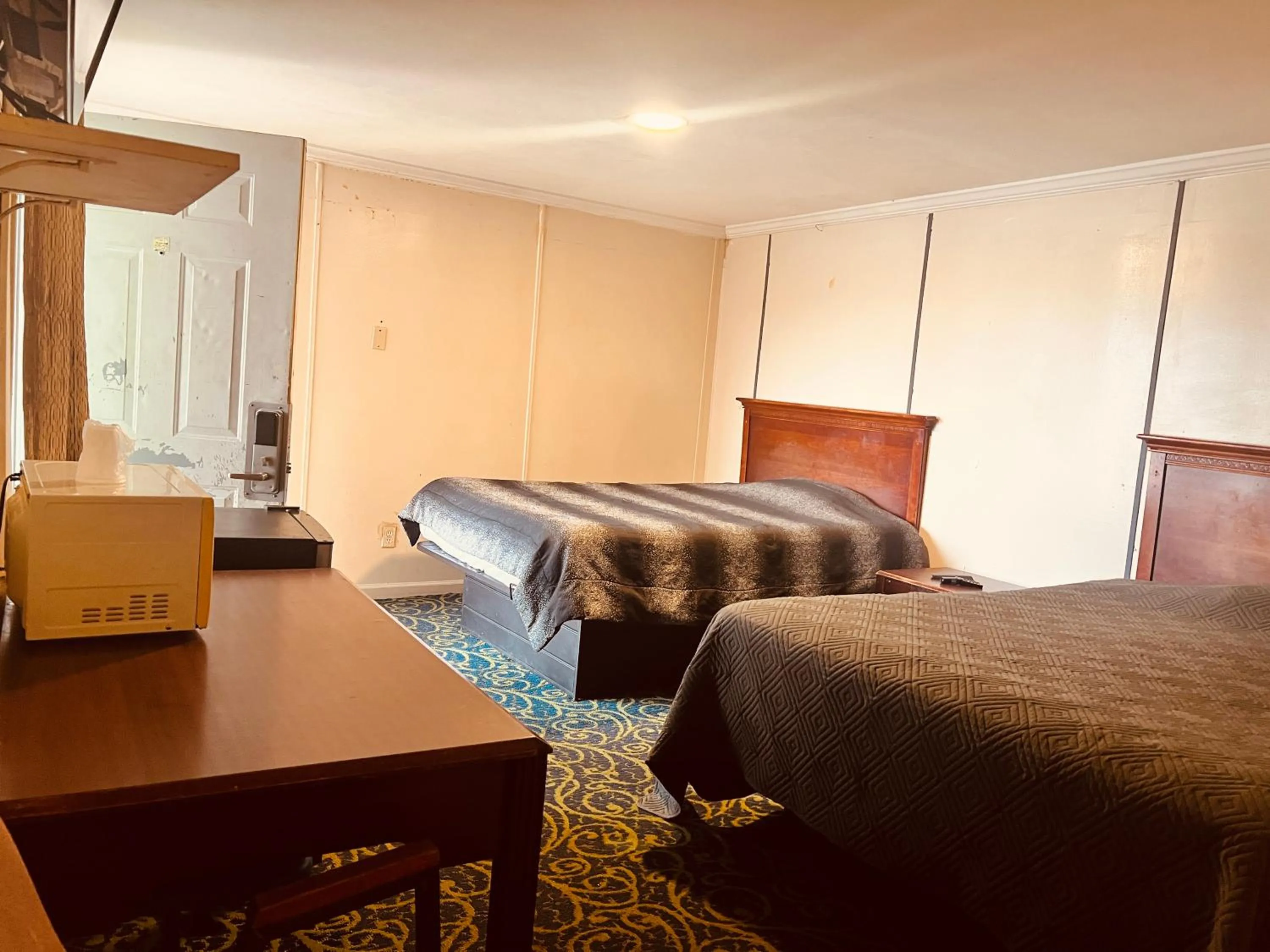 Bedroom in Hotel O East Hemphill Burton-Flint