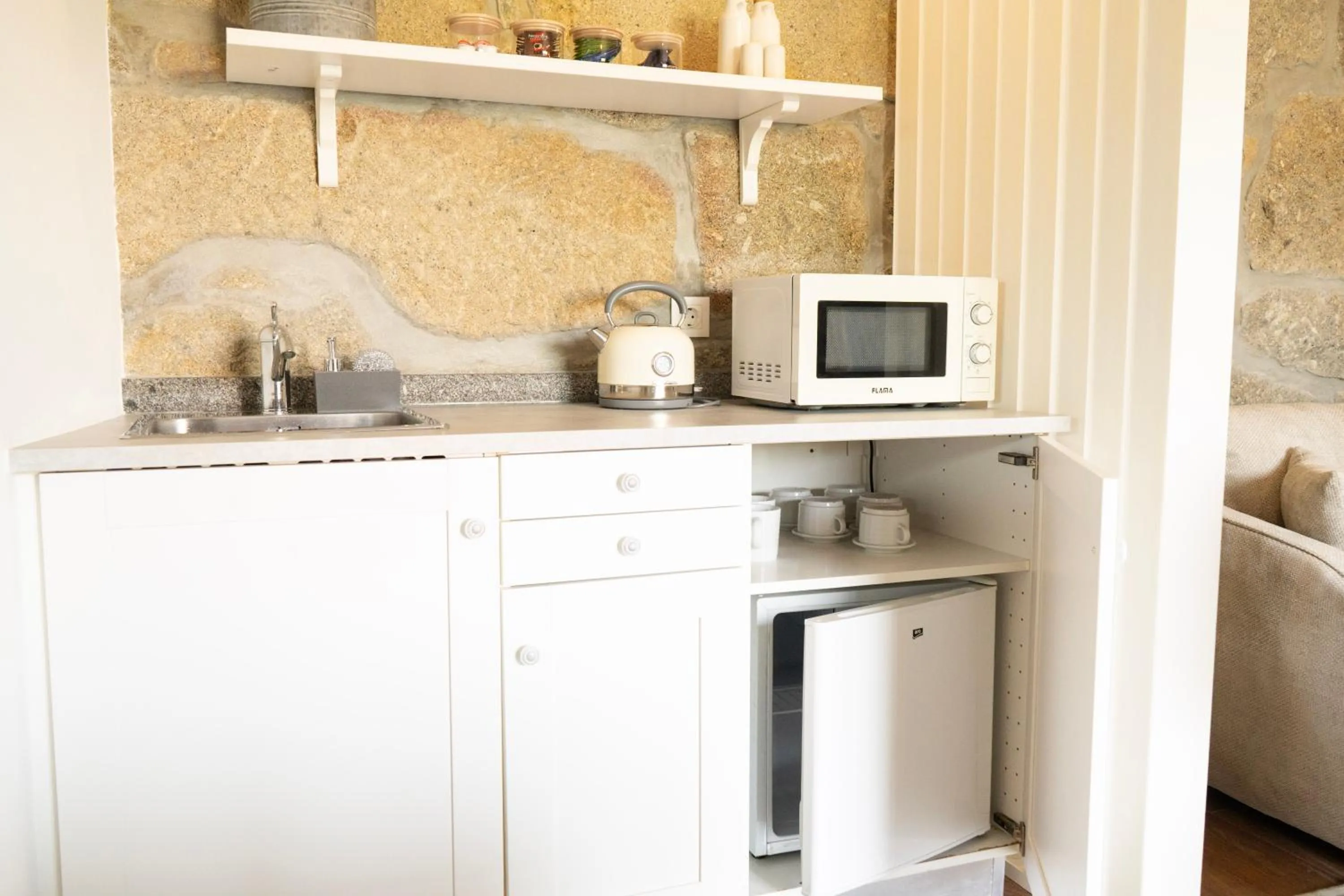 Kitchen or kitchenette in Casa d'Amares