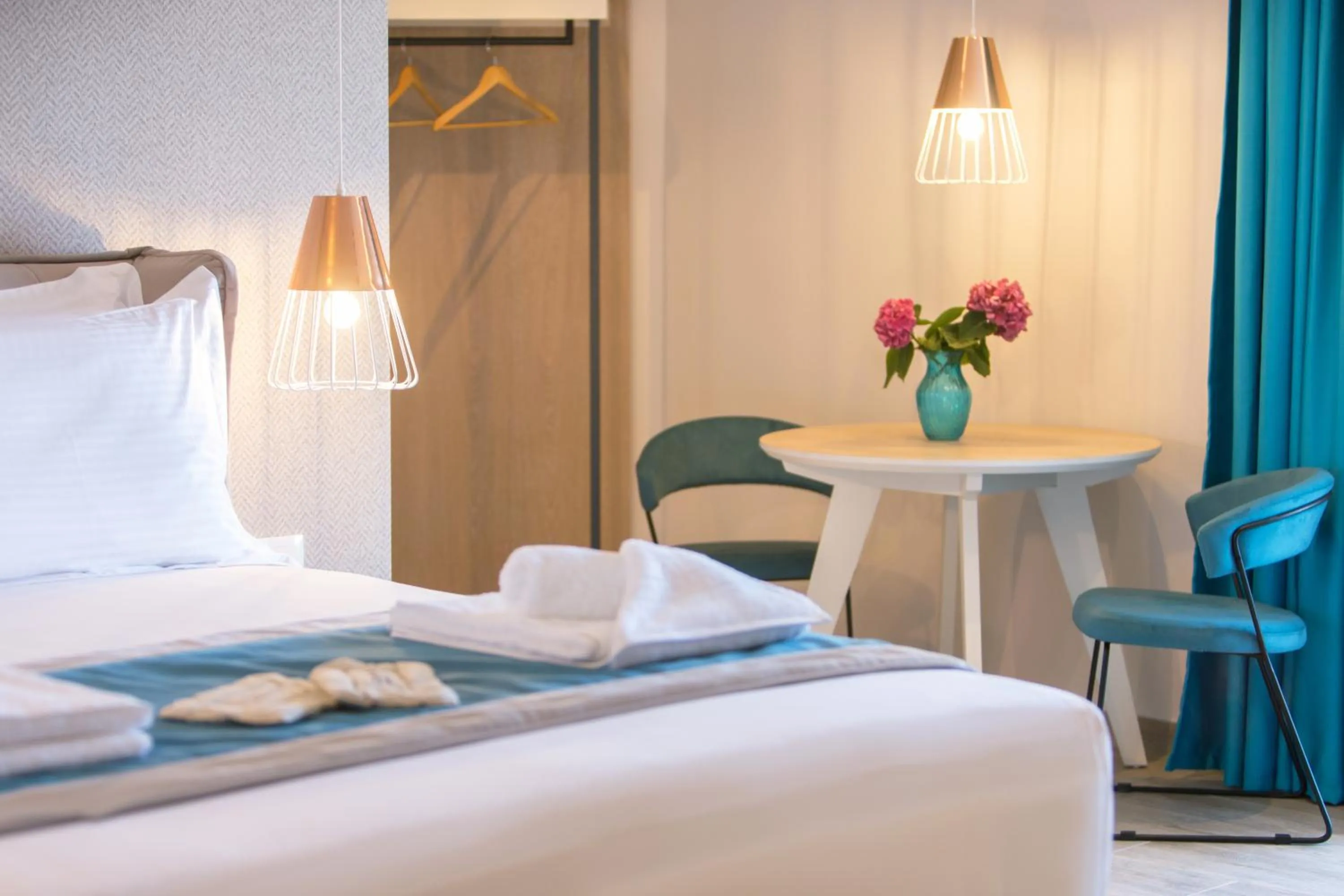 Photo of the whole room, Bed in Iliomagic Luxury Suites Thassos