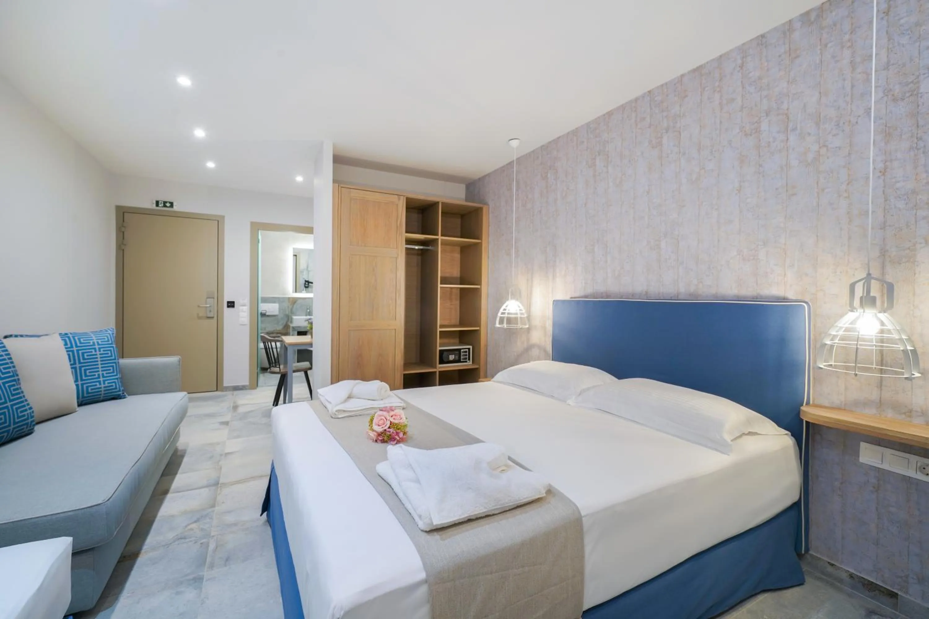 Photo of the whole room, Bed in Iliomagic Luxury Suites Thassos