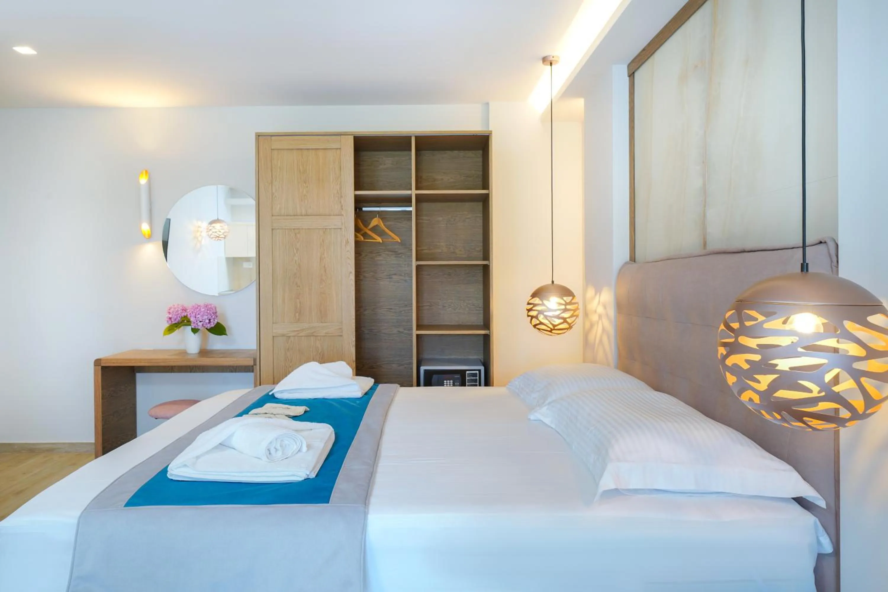 Bed in Iliomagic Luxury Suites Thassos