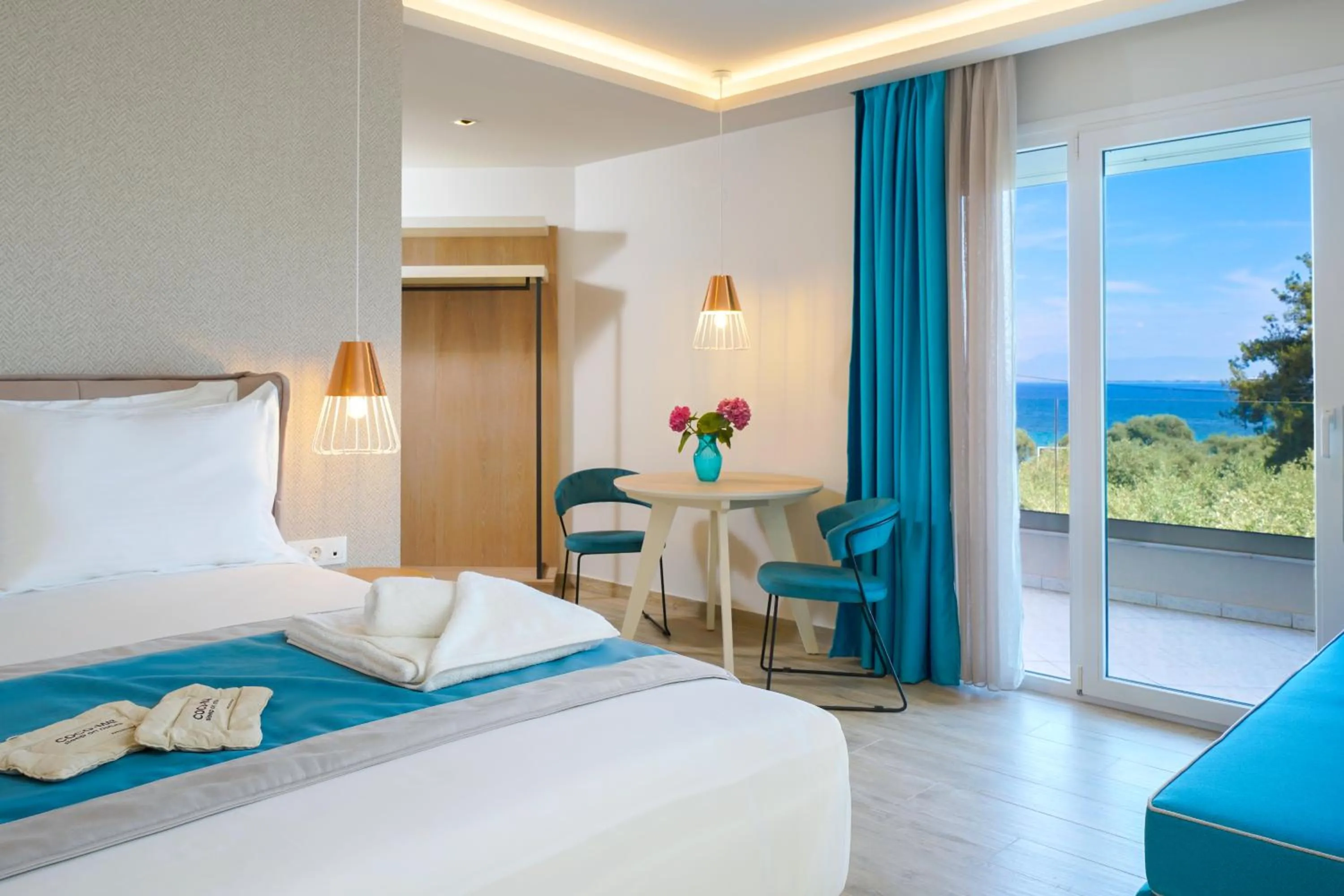 Photo of the whole room, Bed in Iliomagic Luxury Suites Thassos