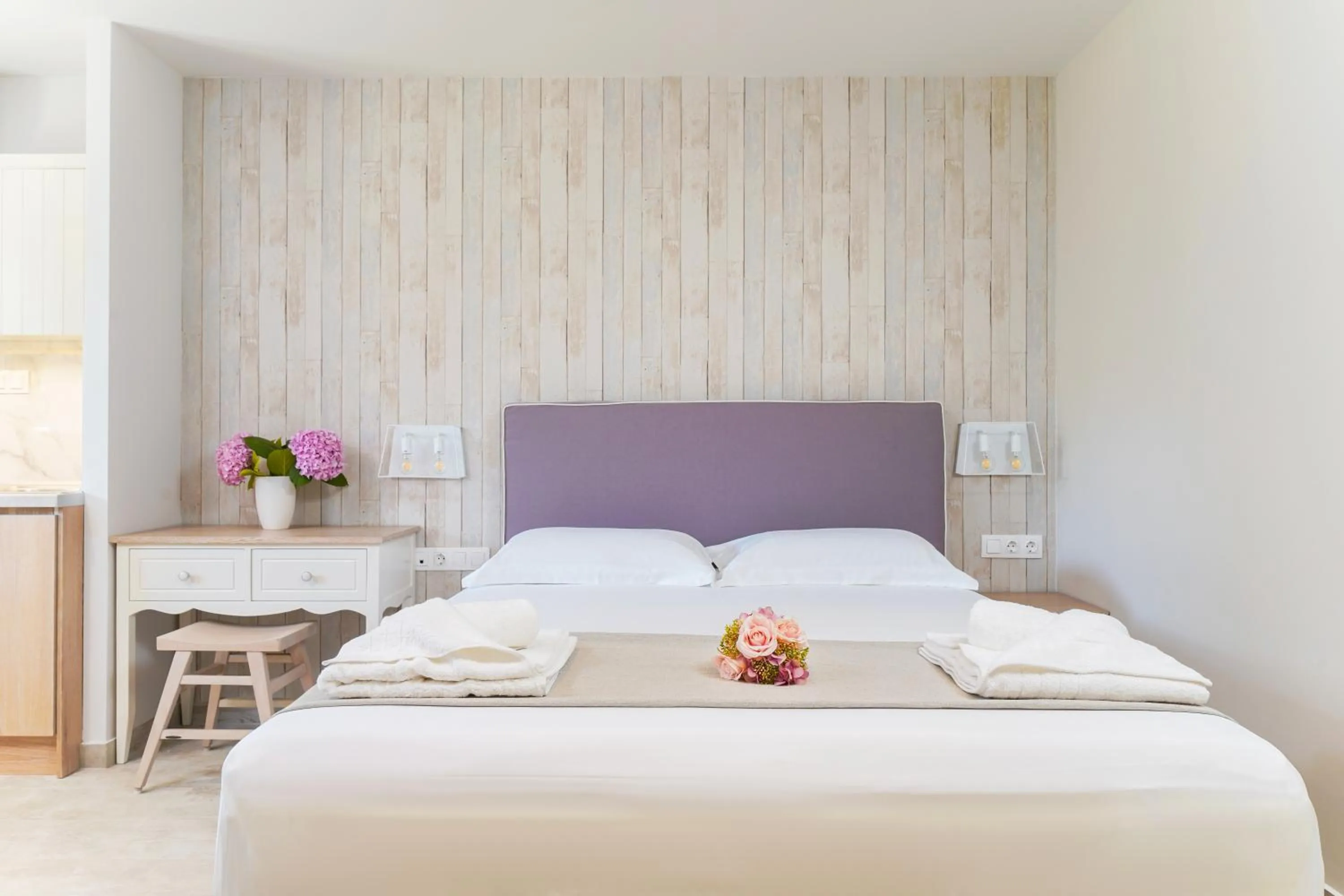 Photo of the whole room, Bed in Iliomagic Luxury Suites Thassos