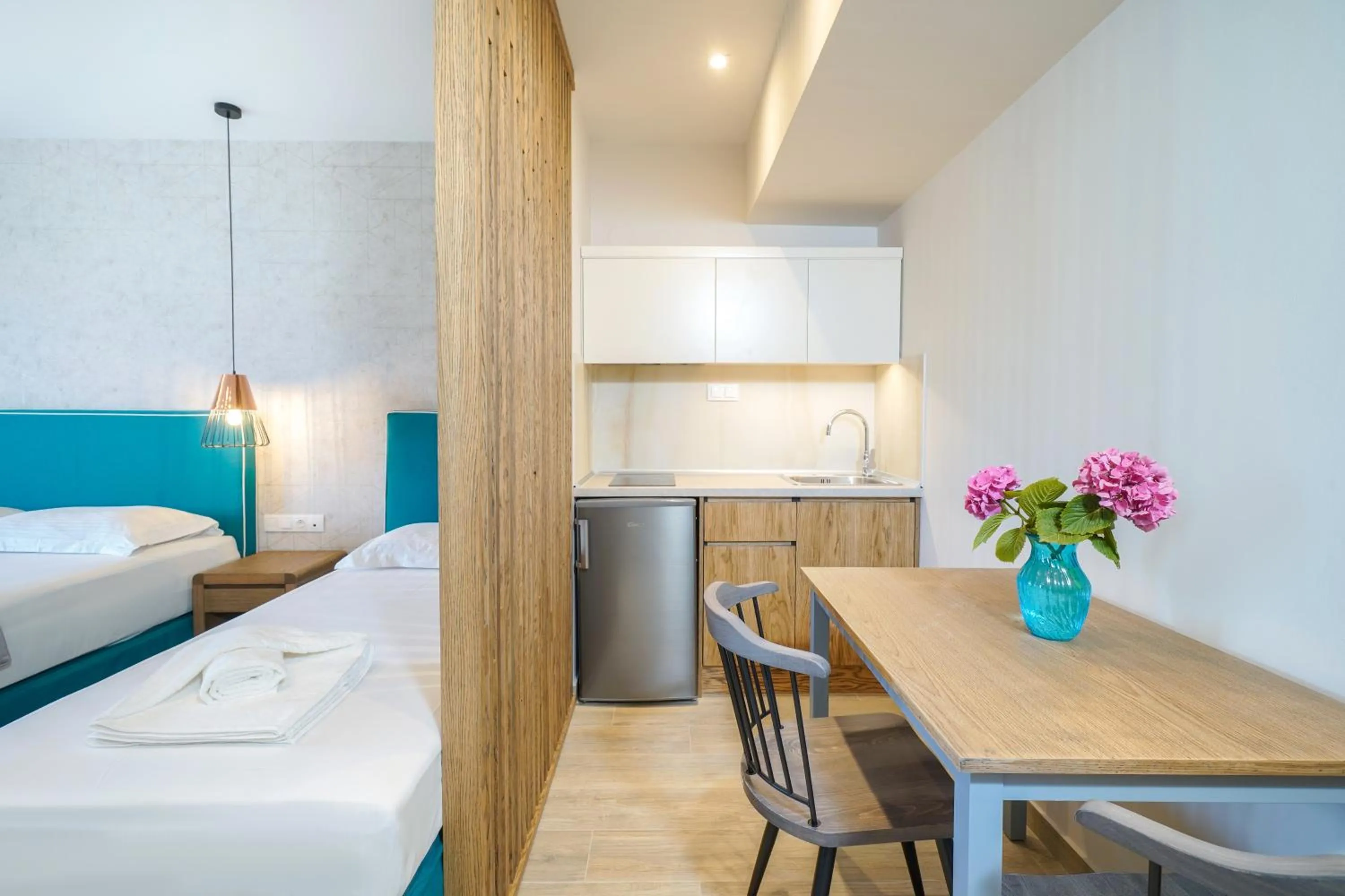 Photo of the whole room, Bed in Iliomagic Luxury Suites Thassos