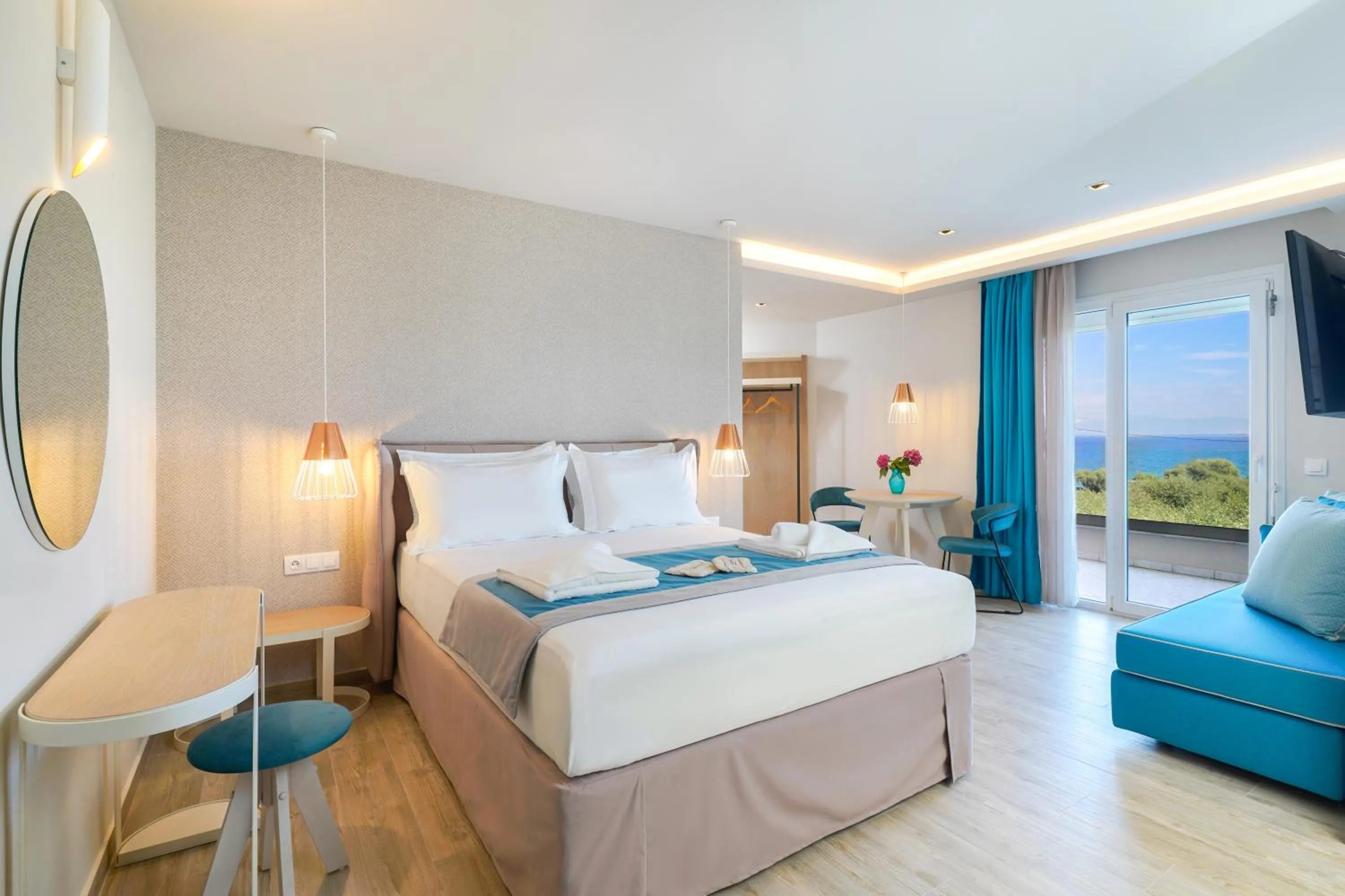 Photo of the whole room, Bed in Iliomagic Luxury Suites Thassos