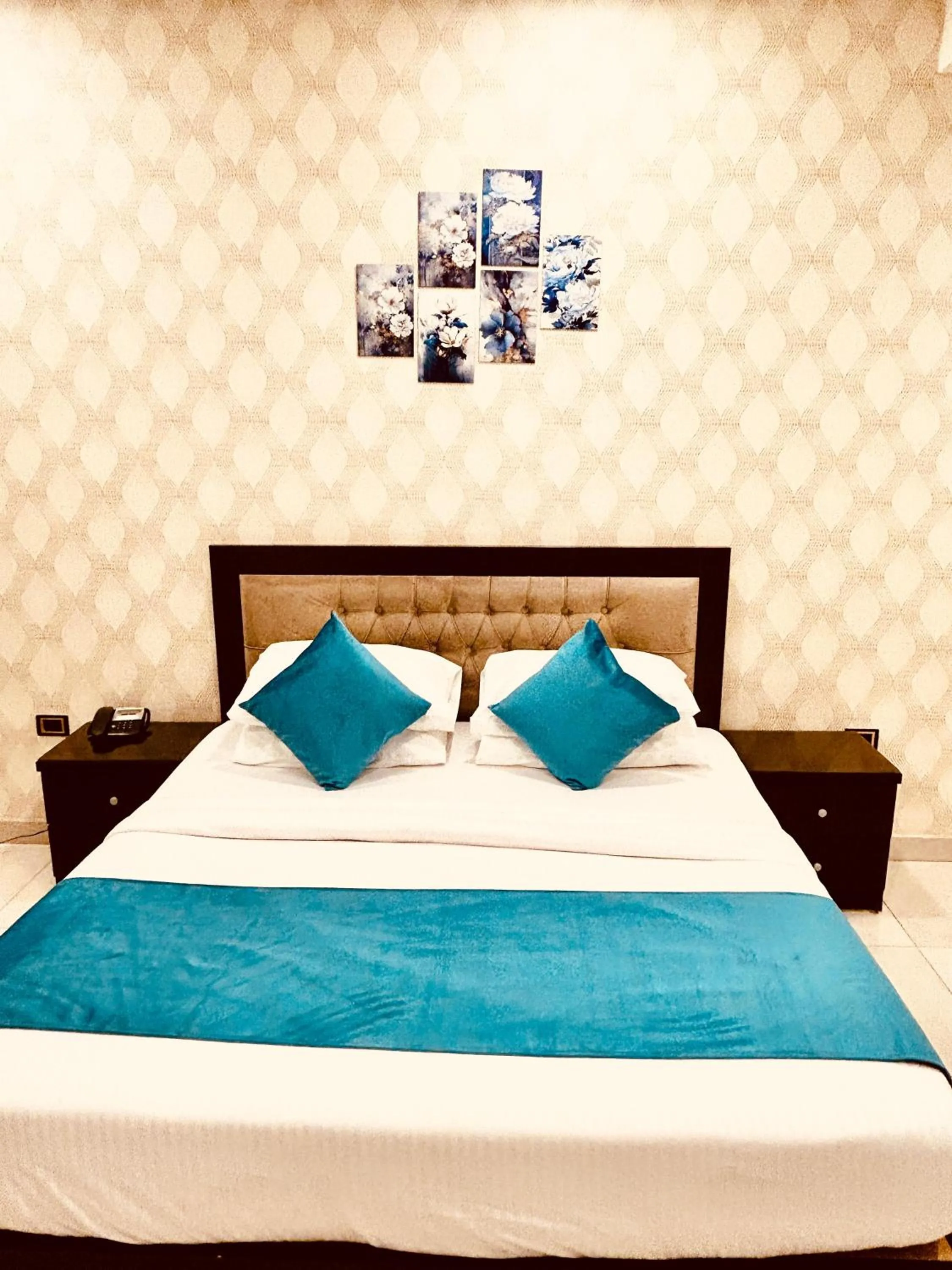 Bed in Panorama Amman Hotel